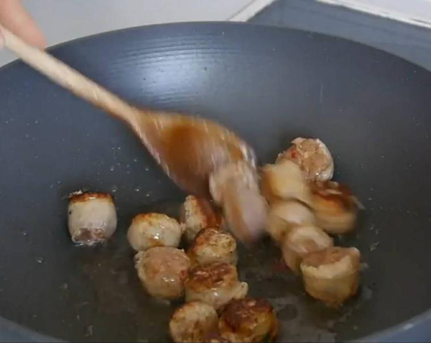 step 1 In a hot pan add the Vegetable Oil (1/4 cup) and leave to warm up. Once warm add the Sausages (2) cut in pieces and brown. Once the sausages are brown remove from the pan and set aside.