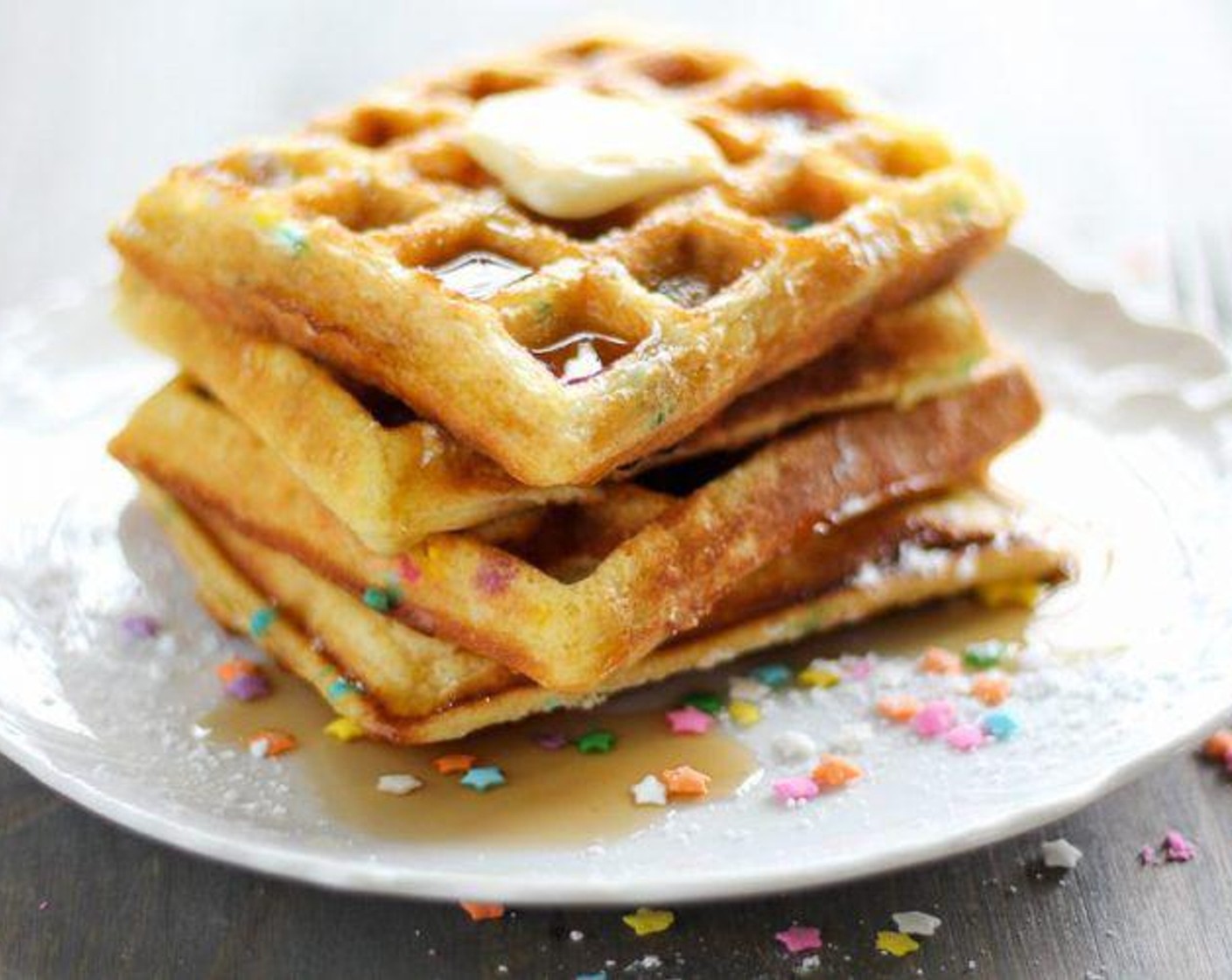 step 4 Close waffle iron and cook until the cake is cooked through and outside is golden brown. Serve with Maple Syrup (to taste) and enjoy!