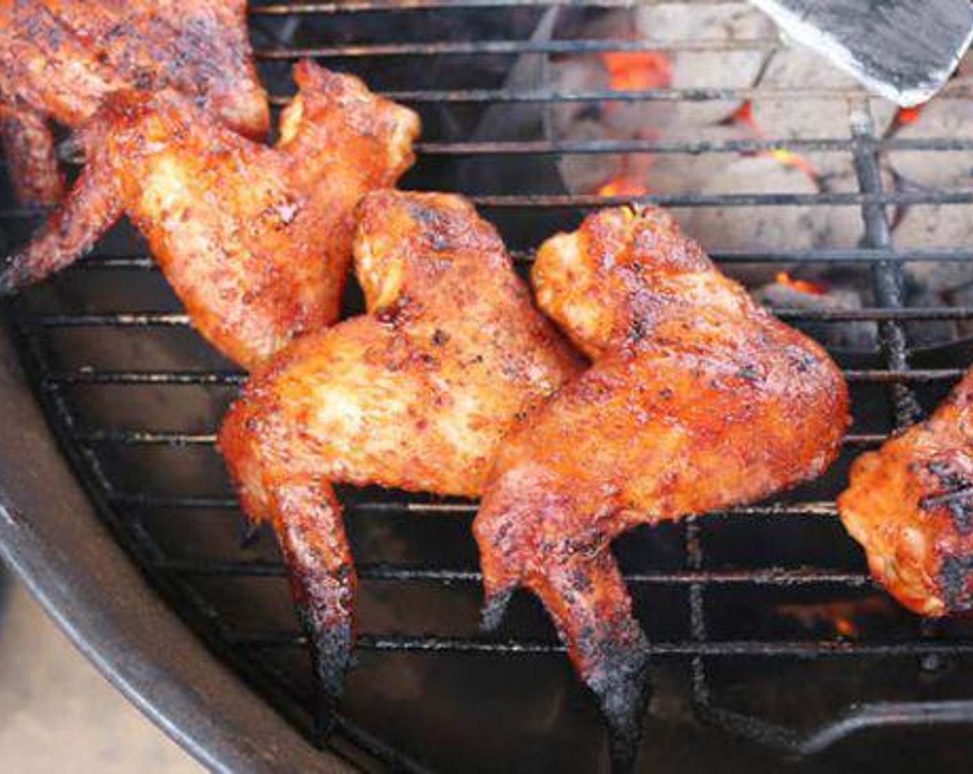 step 6 In a small saucepan over medium heat, melt the Butter (1/2 cup). Add the Hot Sauce (6 fl oz) and Barbecue Sauce (1/4 cup) and reduce heat to simmer while the wings cook.