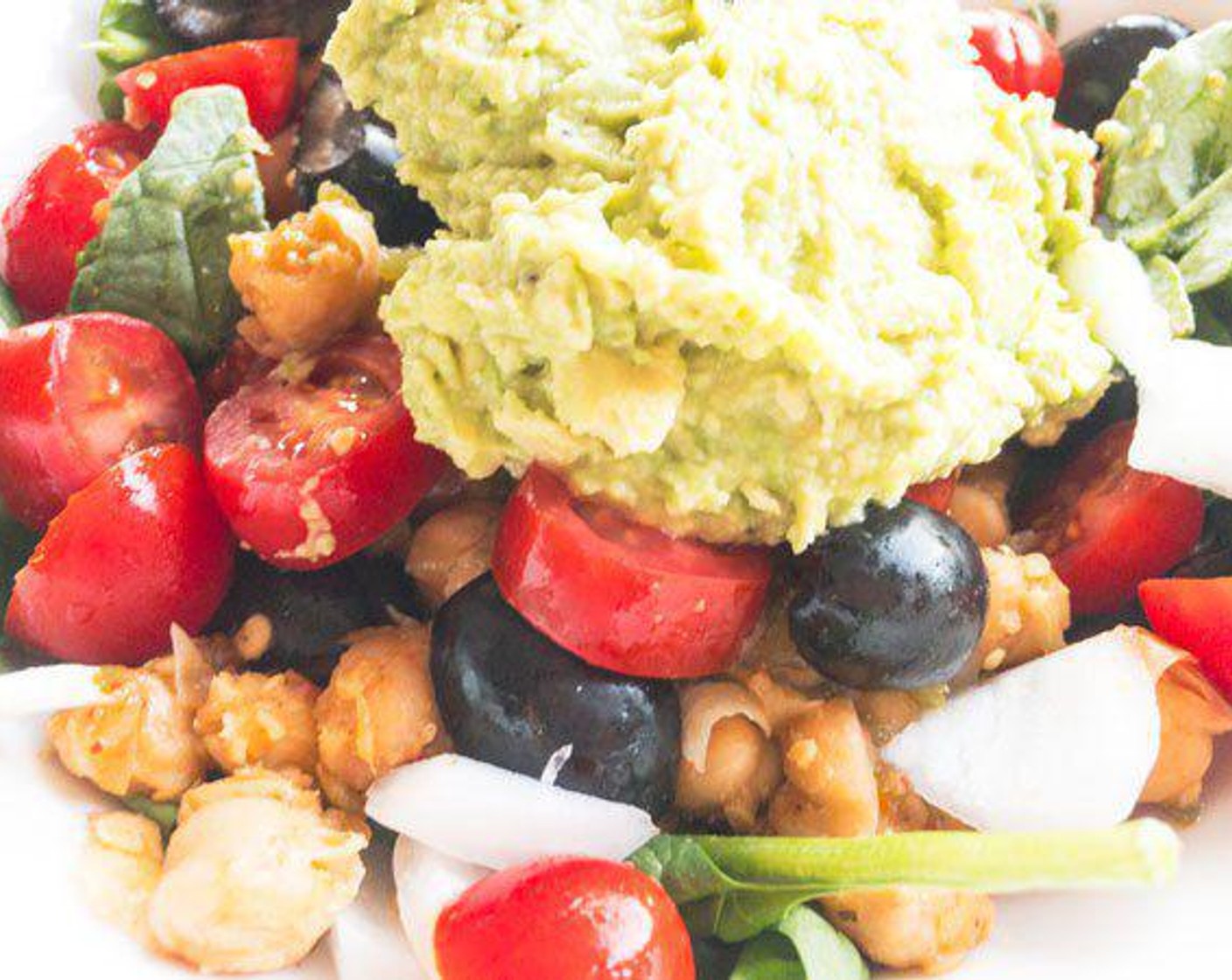 step 2 To a bowl, add Fresh Spinach (4 cups), chickpeas, Black Olives (1/2 cup), Grape Tomatoes (1/2 cup), White Onion (1/2 cup) and more salsa if desired. Toss to combine.