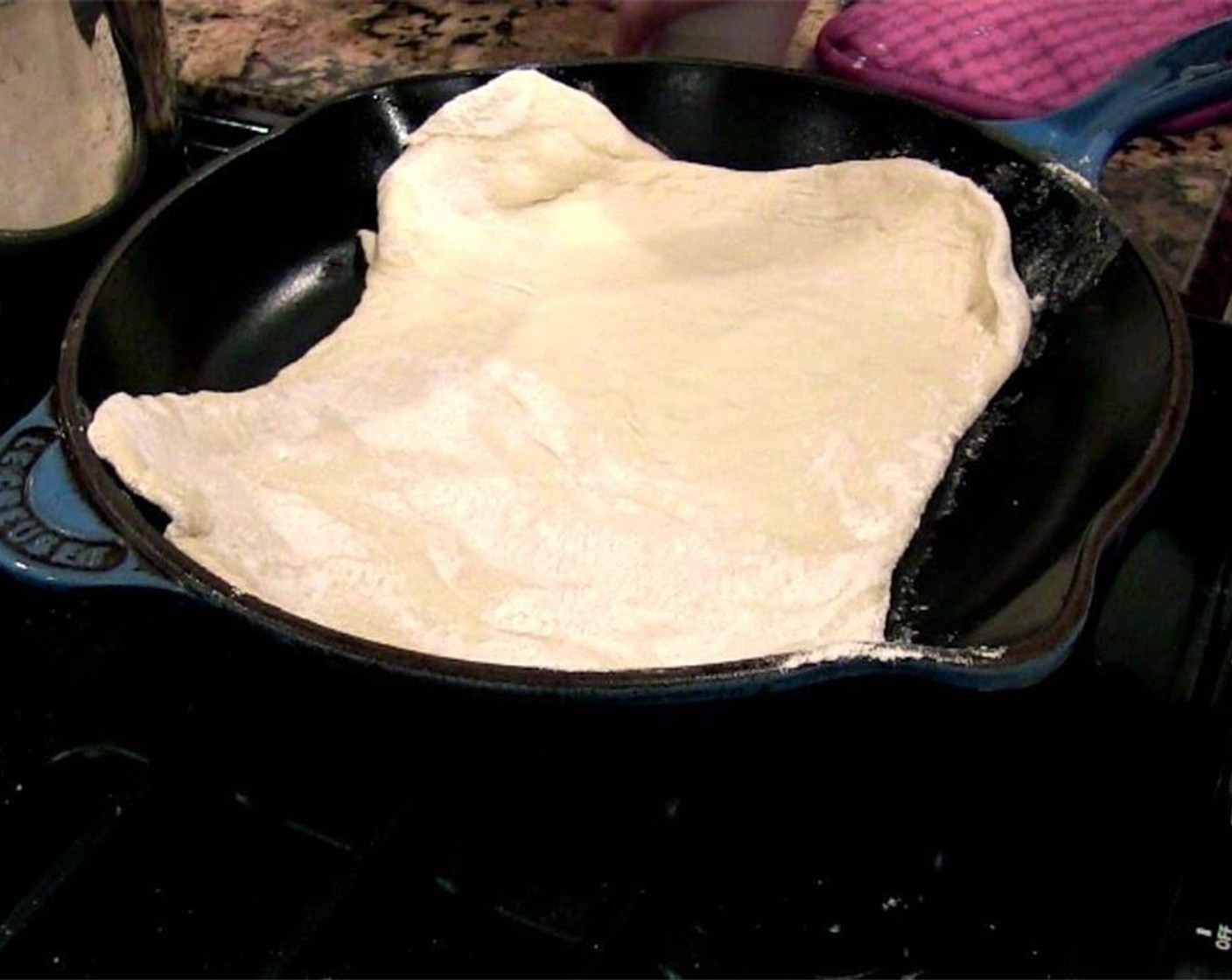 step 10 Place the rolled out dough gently into the hot, dry skillet.