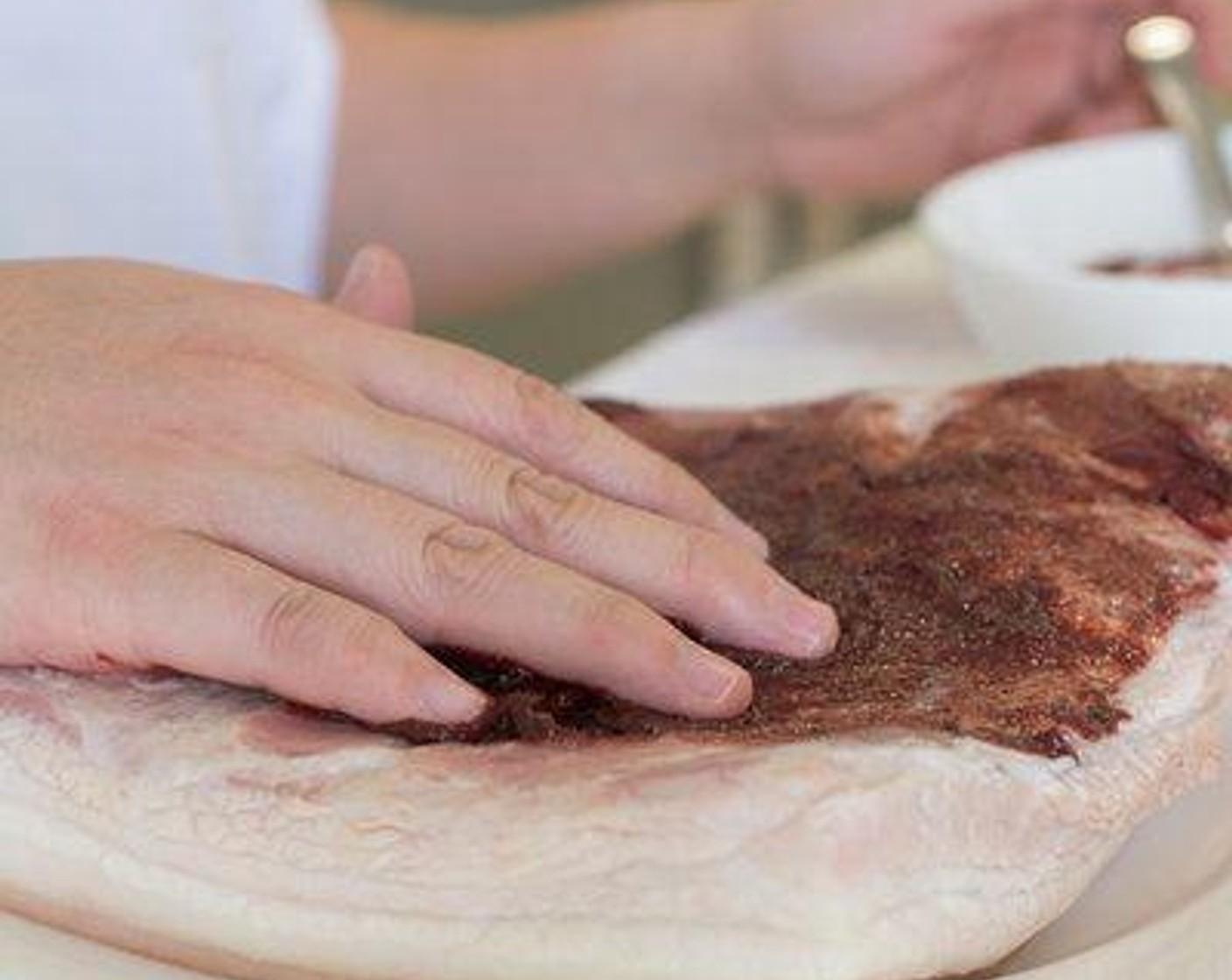 step 5 Rub the marinade on the meat side of the pork belly. Do not rub the marinade on the skin.