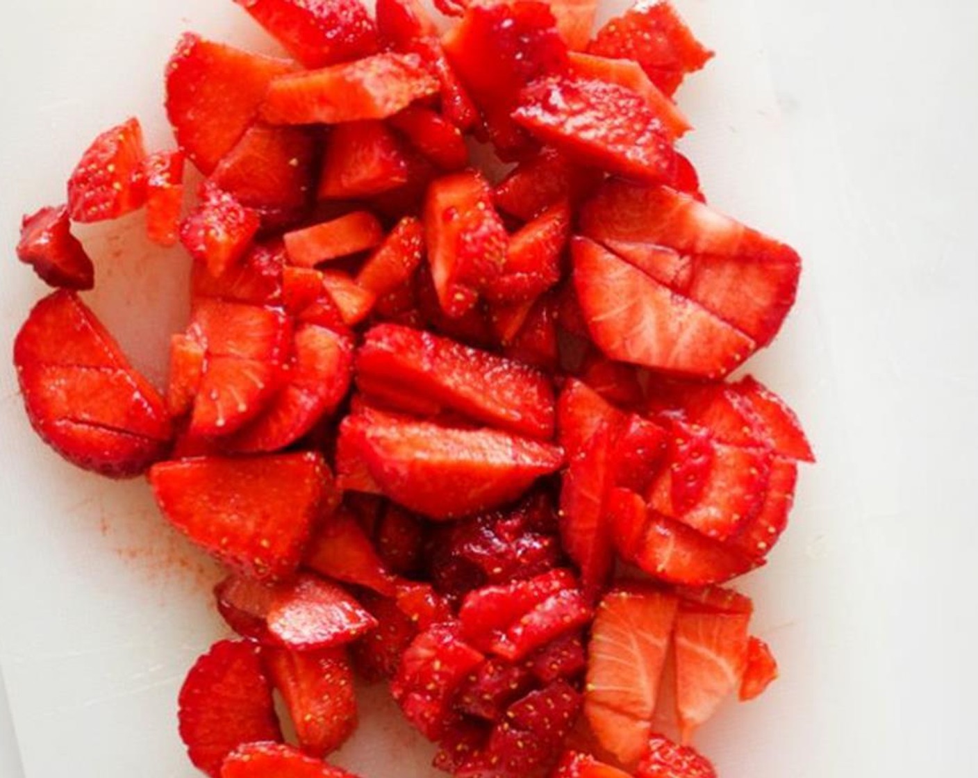 step 2 In a small bowl, mix together Fresh Strawberry (1/2 cup), Cream Cheese (1/4 cup), Granulated Sugar (1/2 Tbsp), and Salt (to taste). Gently spoon the mixture evenly into the bread pockets, being careful not to poke a hole in the bread.