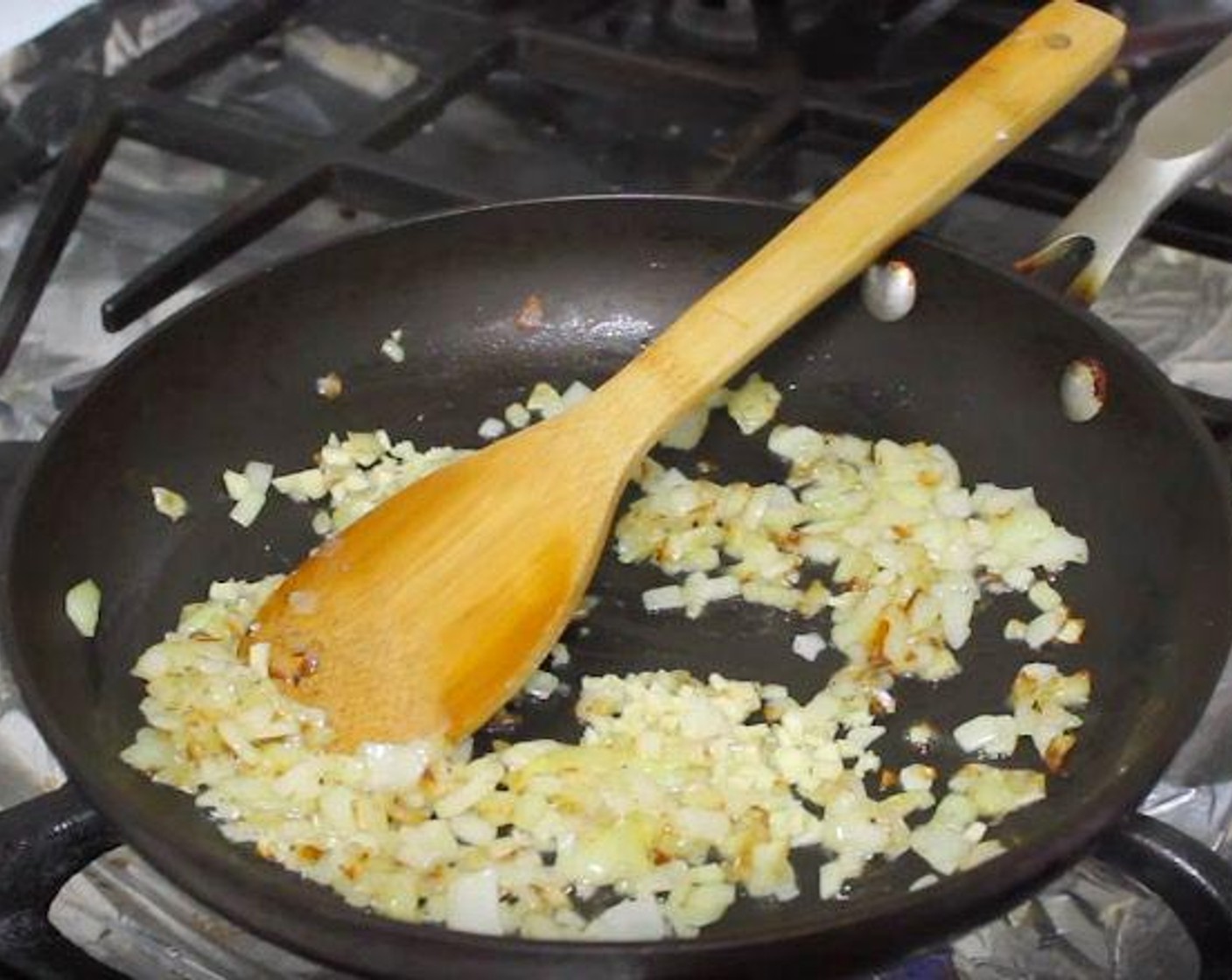 step 1 In a frying pan, heat Cooking Oil (1 Tbsp) and Butter (1 Tbsp). Add Onion (1) and saute for 5-7 minutes, until onions are soft and golden brown. Season with Salt (to taste) and Ground Black Pepper (to taste).