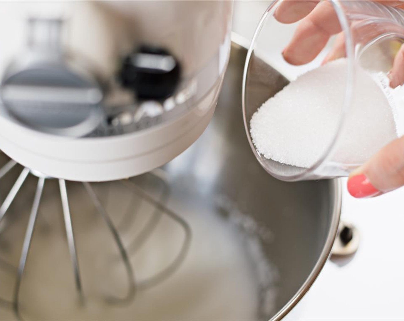 step 8 Add Granulated Sugar (2 Tbsp), and beat on high speed until glossy, about six minutes. Transfer egg whites to a separate bowl.