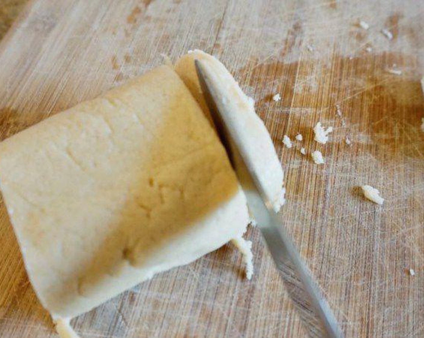 step 6 Remove the chilled dough from the refrigerator and side the dough until 1/4-inch slices. Place the cookies about an inch a part on the cookie sheet. Top each cookie with a few Pistachios (1/2 cup).