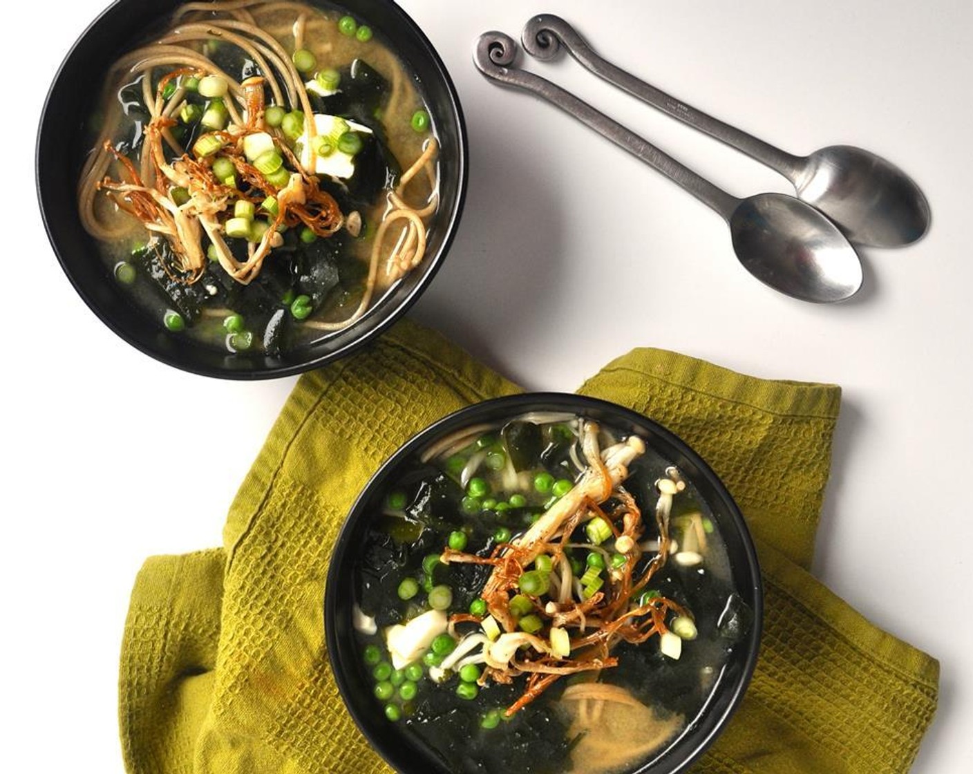 step 7 Add the Green Peas (1 cup) and Soba Noodles (5.5 oz) and re-heat for about 1 minute. Serve topped with crispy enoki mushrooms.