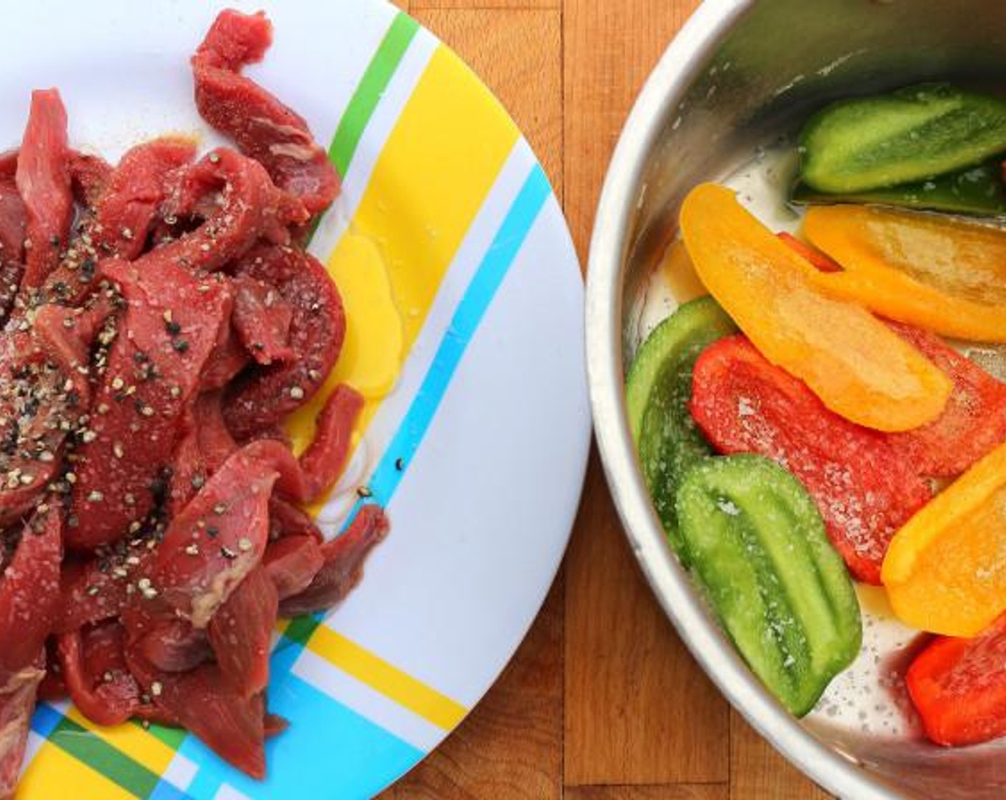 step 2 Season the beef and Red Bell Pepper (1), Yellow Bell Pepper (1), and Green Bell Pepper (1) with Kosher Salt (to taste), Cayenne Pepper (to taste) and Granulated Garlic (to taste) to taste, then add 1 tablespoon of Peanut Oil (2 Tbsp) to each.