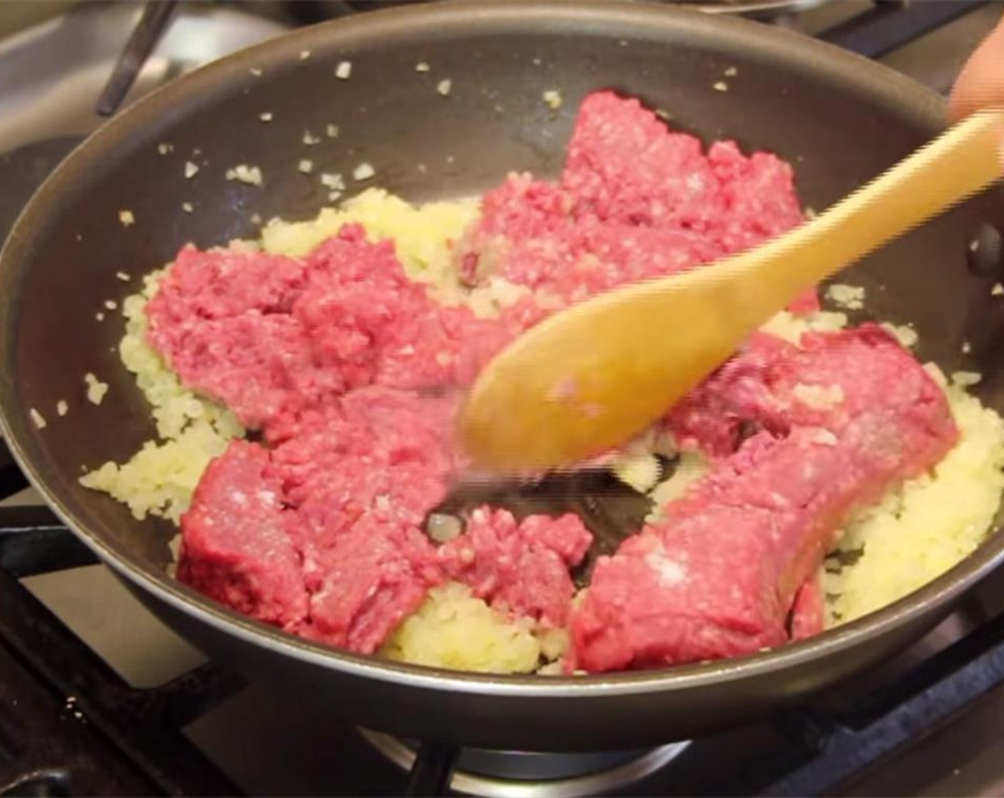 step 3 Add Ground Beef (1.5 lb) and Salt (1/2 Tbsp). Cook over medium heat, breaking up beef and stirring, until completely browned.