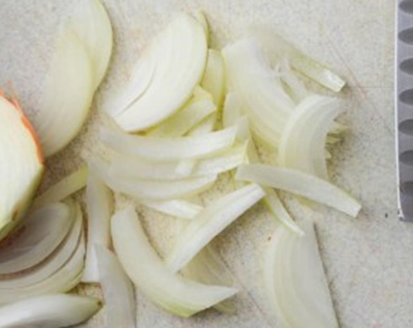 step 4 In a large skillet or dutch oven, heat the Olive Oil (1 Tbsp) and add the button mushrooms  and large onion and cook, stirring occasionally until vegetables have softened and take on a little color. Transfer the vegetables to a bowl.