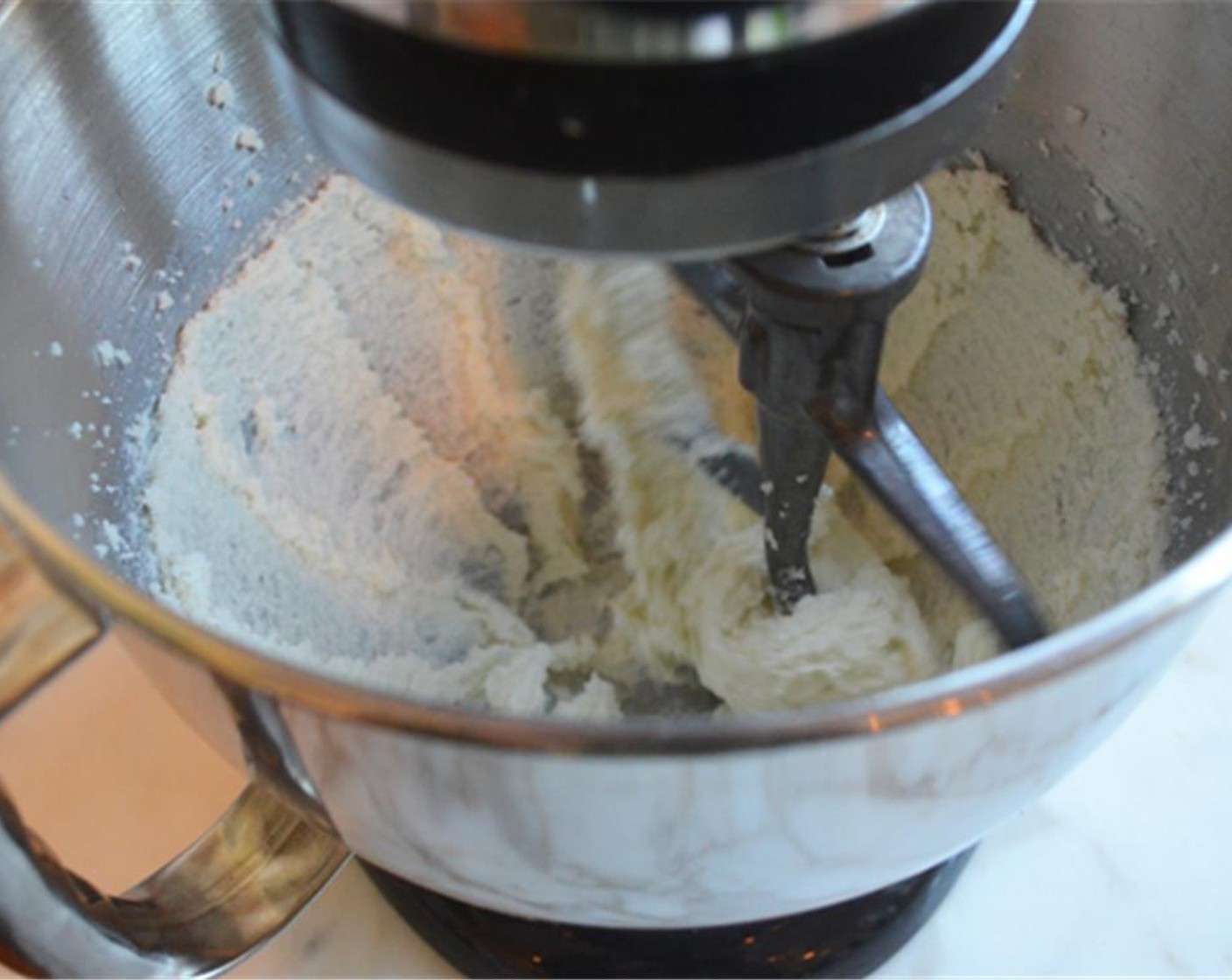 step 3 In the bowl of an electric mixer, cream the Butter (1 stick). Granulated Sugar (3/4 cup) and an additional 2 tablespoons of sugar until light and fluffy, 1 to 2 minutes. Scrape down the sides of the bowl with a rubber spatula.