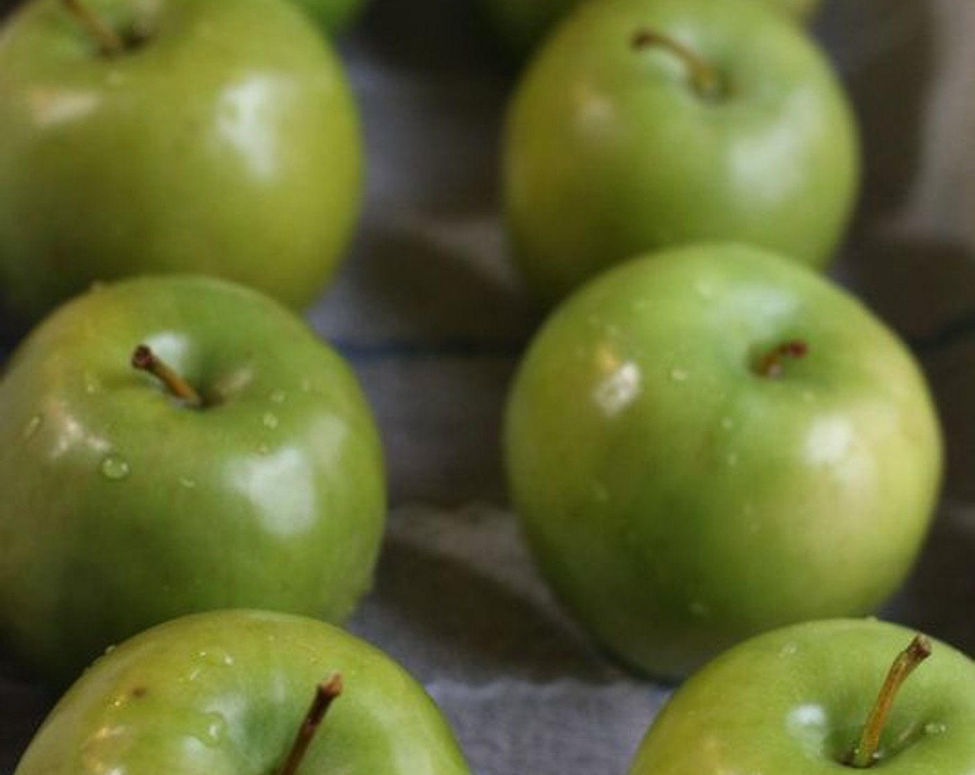 step 1 Dip Granny Smith Apples (6) in boiling water for 10 seconds, then rinse and thoroughly dry apples with a soft towel, buffing each apple to remove any remaining wax residue.