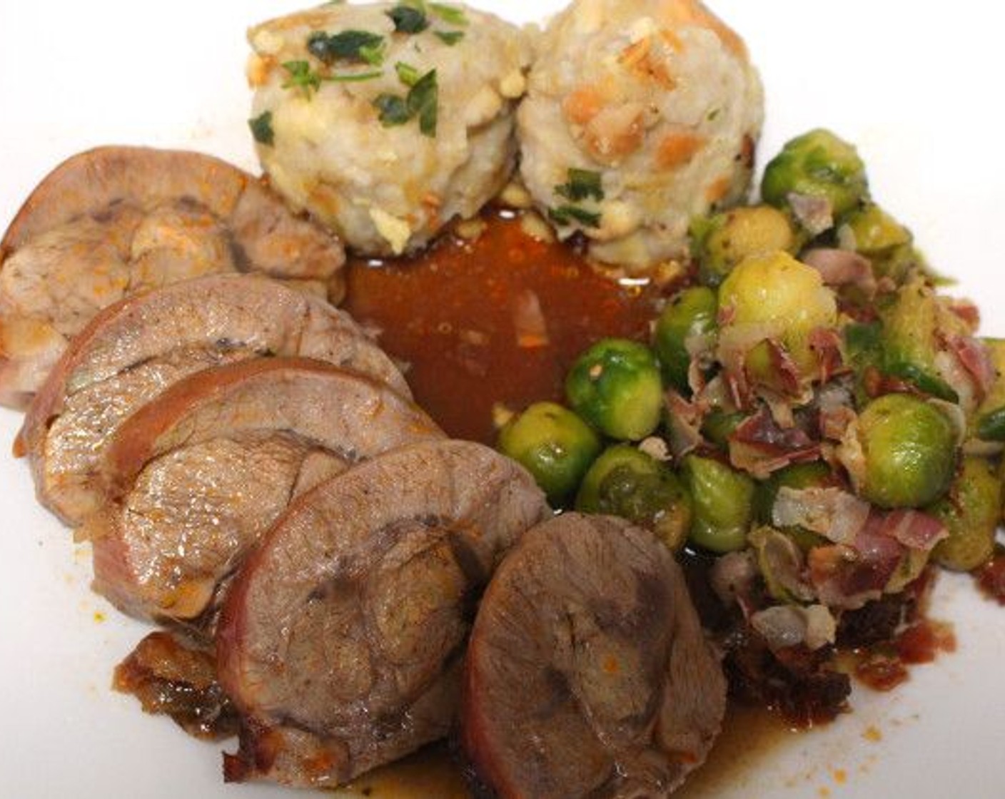 step 6 Carve the veal shank and serve with Brussels sprouts.