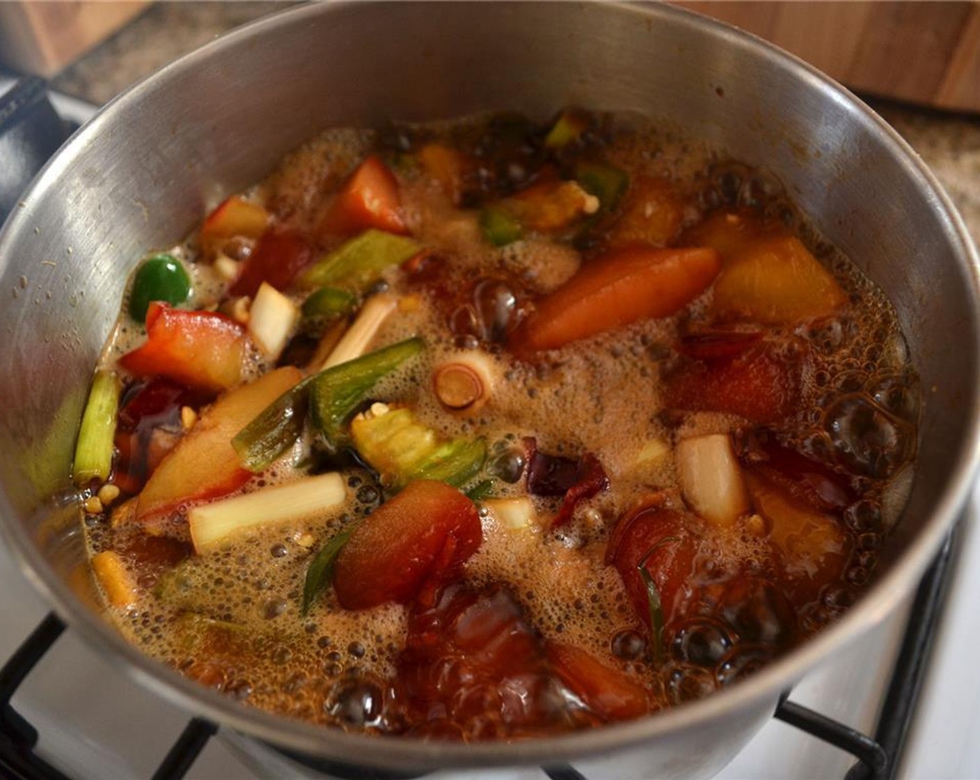 step 7 Reduce to medium-low and simmer, uncovered, until plums are very soft, about 5 minutes.