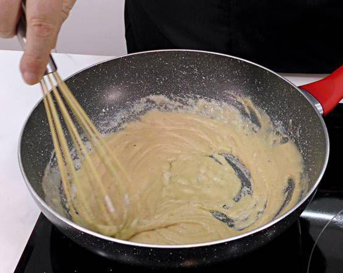 step 3 In another hot pan add Butter (1/2 cup) and let it melt. When the butter is almost melted mix in the Ground Nutmeg (to taste). Add the All-Purpose Flour (1 cup) and mix well until flour and butter are thoroughly mixed.