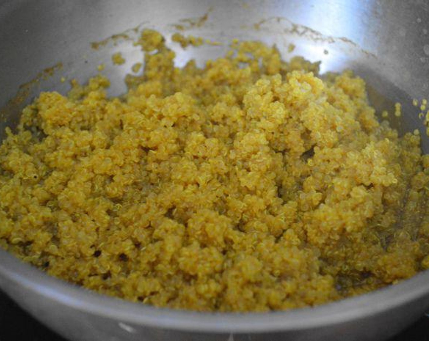 step 4 Once the stock is boiling, pour the Quinoa (1 cup) into it and give it a stir. Cover the pot and turn the heat to low. Let the quinoa cook for 12-15 minutes, until the liquid is all absorbed and it is tender.