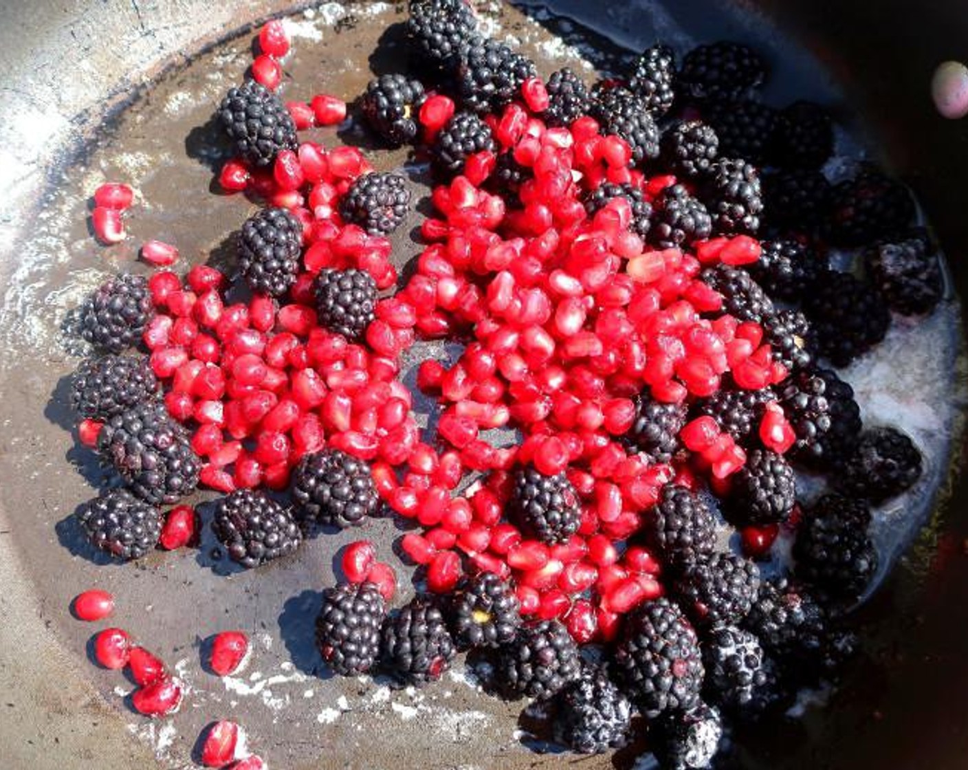 step 2 Add Fresh Blackberries (4 cups) and Pomegranate Seeds (2 cups), cook another minute or until the fruit has warmed through, set aside, keep warm.