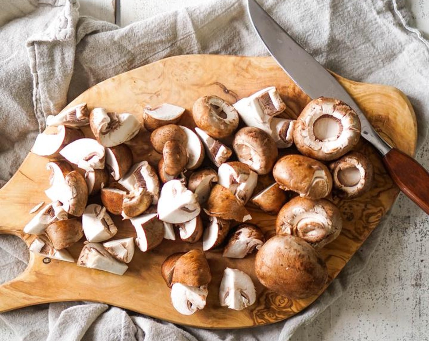 step 5 Heat the Butter (1 Tbsp) and 2 counts of Olive Oil (as needed) in a medium sauce pan. Add the Baby Bella Mushrooms (6 cups) and cook 5-6 minutes until soft and brown.