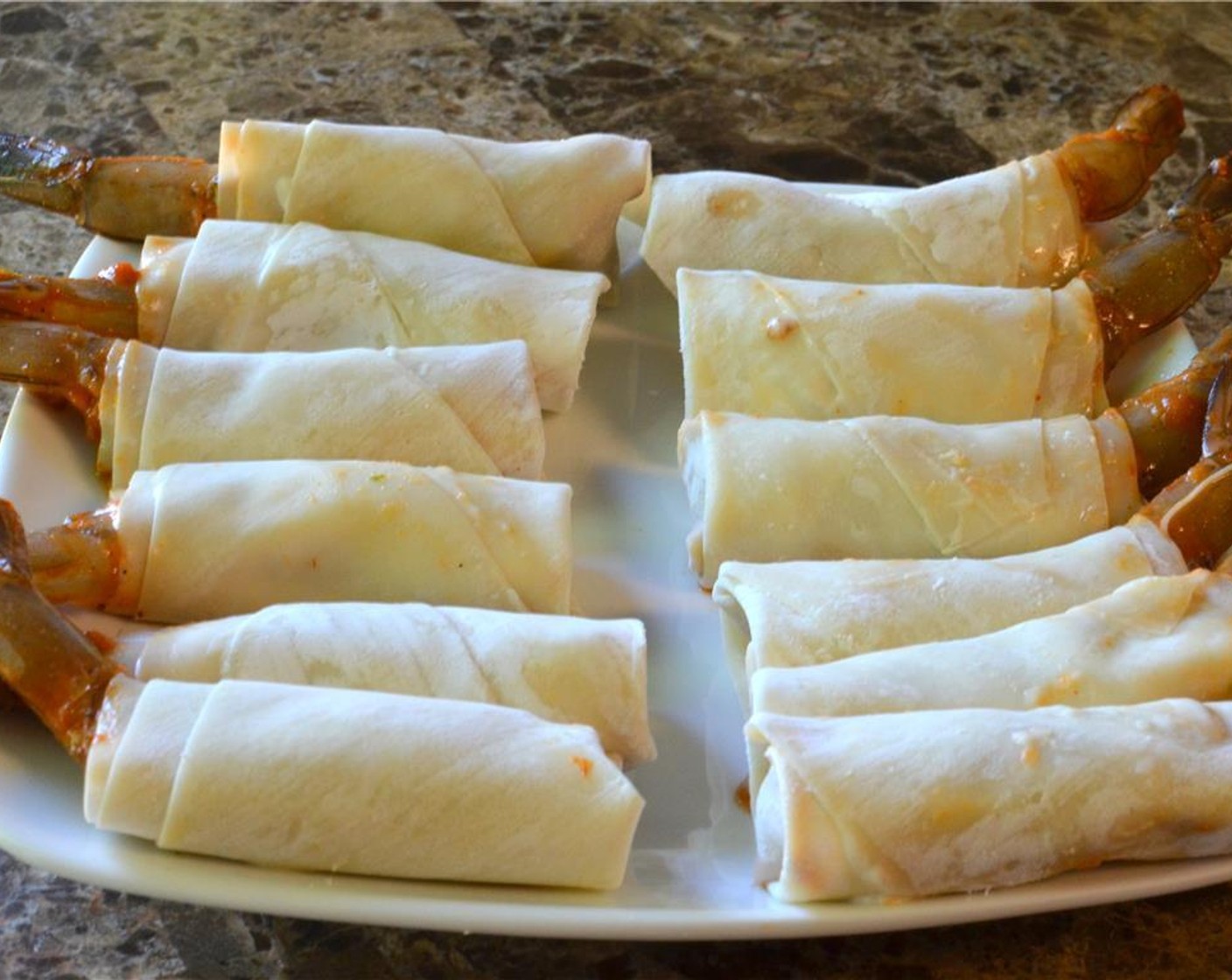 step 12 Repeat the same wrapping method for the rest of the shrimp.