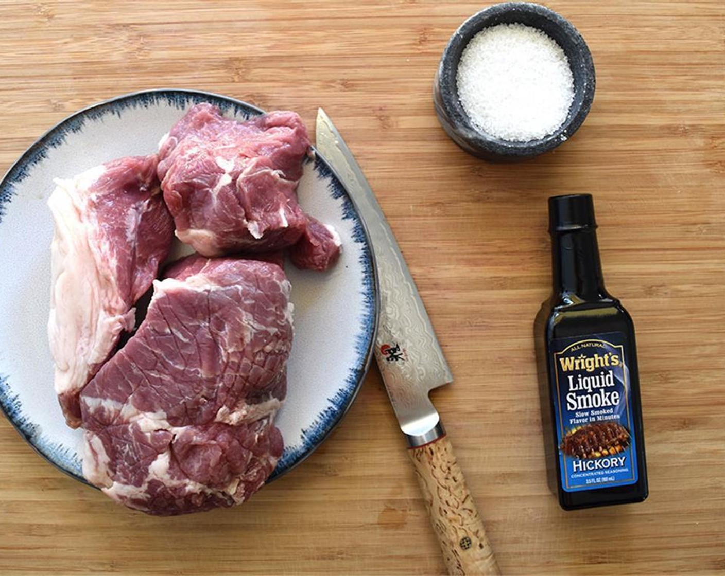 step 1 Gather your Pork Shoulder (3 lb), Salt (2 Tbsp), and liquid smoke.