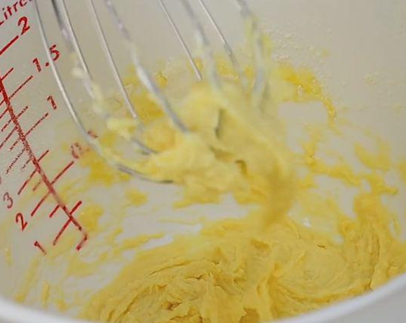 step 5 Add in the egg yolk mixture. Mix again till smooth and set aside.
