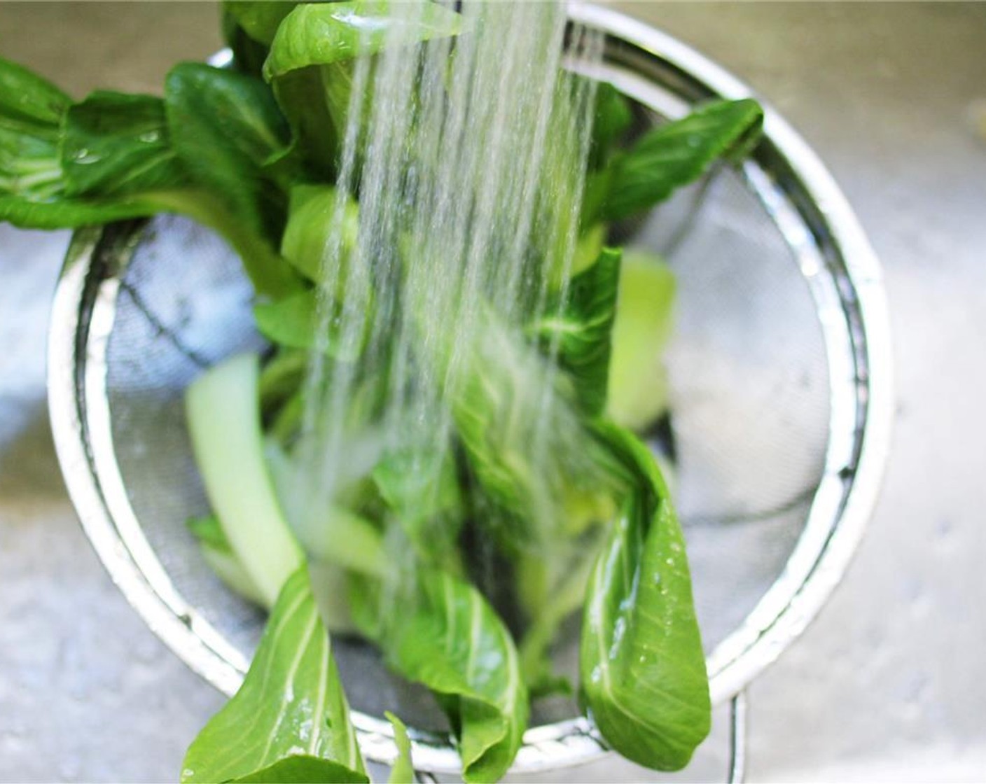 step 3 Wash, trim and discard the rough bottoms from the Baby Bok Choy (6 cups). Separate leaves, rinse, and pat dry.