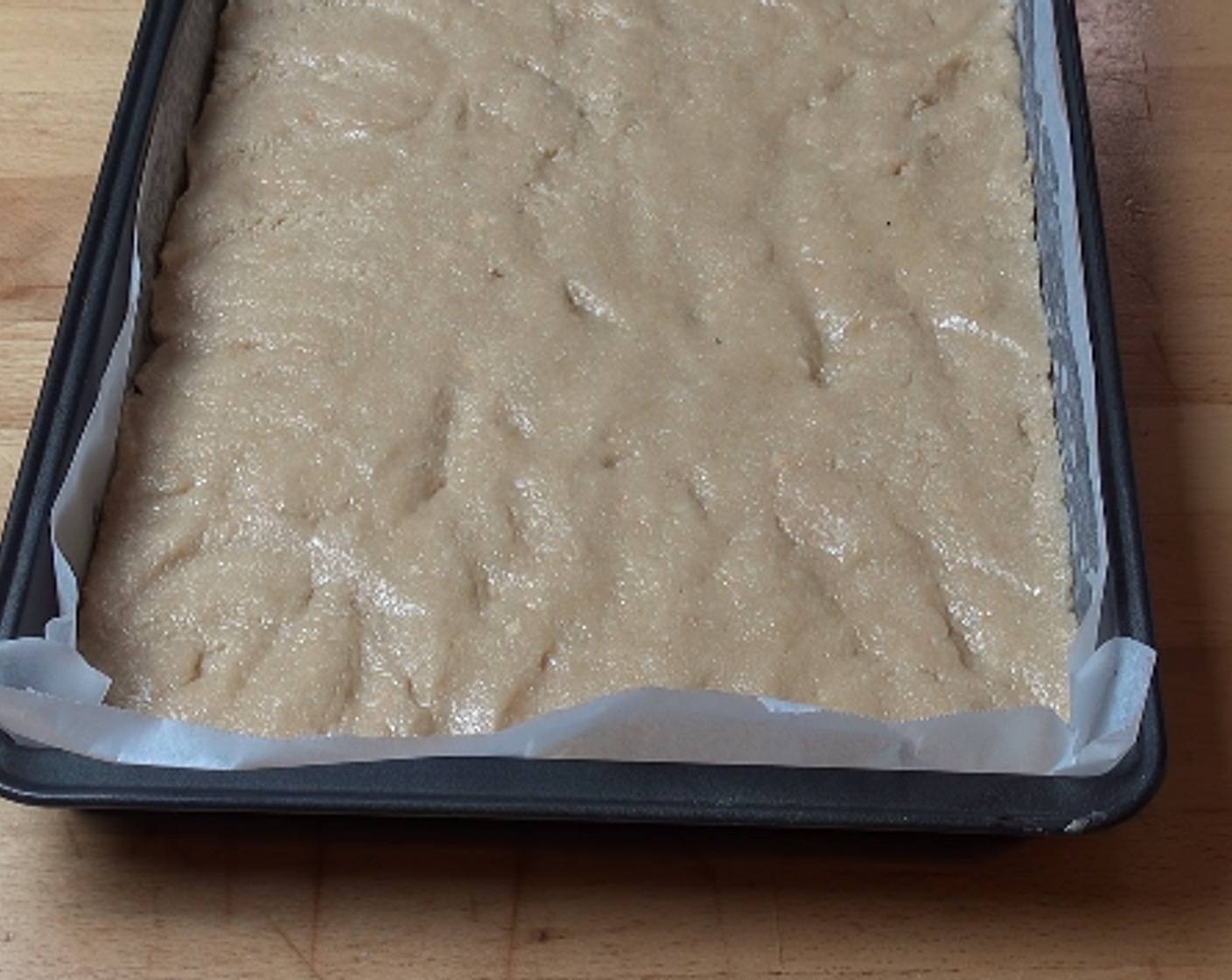 step 3 Grease and line a brownie tray with non-stick baking paper. Press cookie mixture into base.Chill cookie base in fridge.