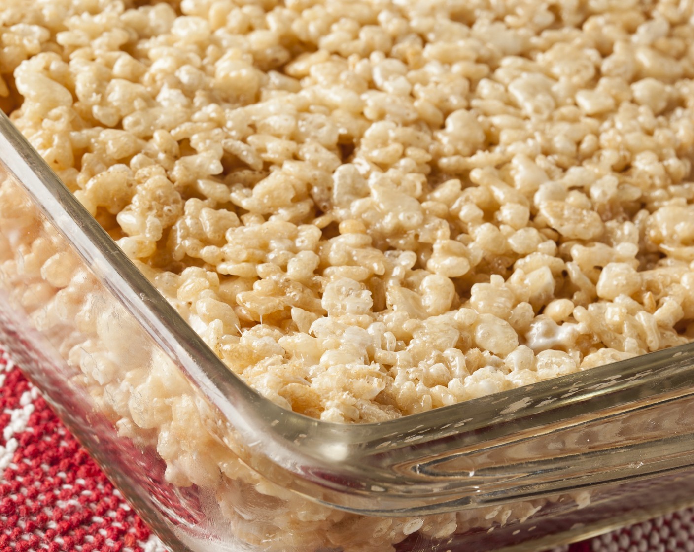 step 4 Cover 9x13 inch pan with Nonstick Cooking Spray (as needed). Drop in the cereal mixture and spread evenly in the pan. Press down the top of the bars with a sheet of parchment paper to make them flat. Let cool for two hours.