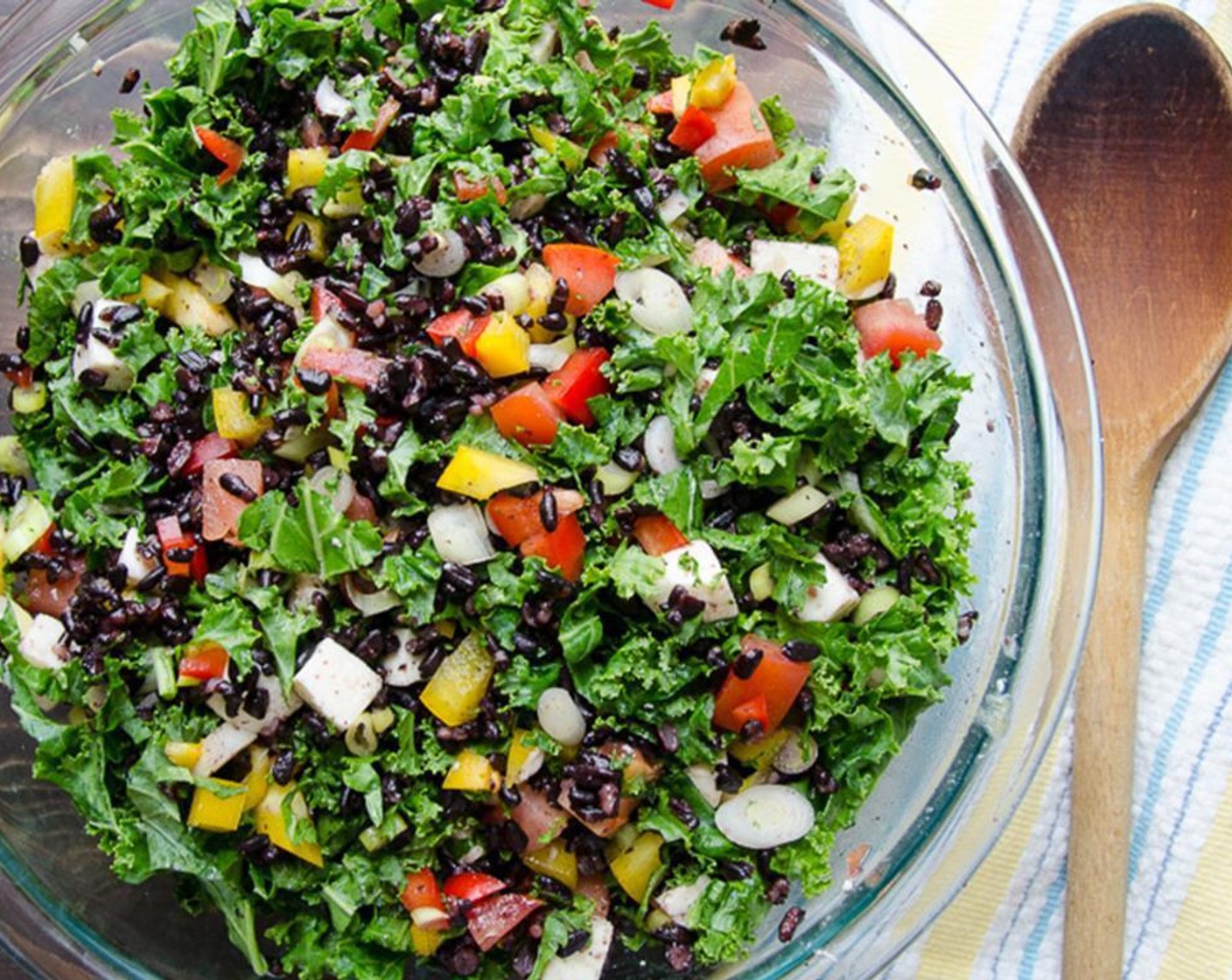 step 5 Dice the Tomato (1) into 1/2-inch pieces. Combine the rice, bell peppers, onion, tomato, mozzarella, and kale into a large bowl. Set aside.