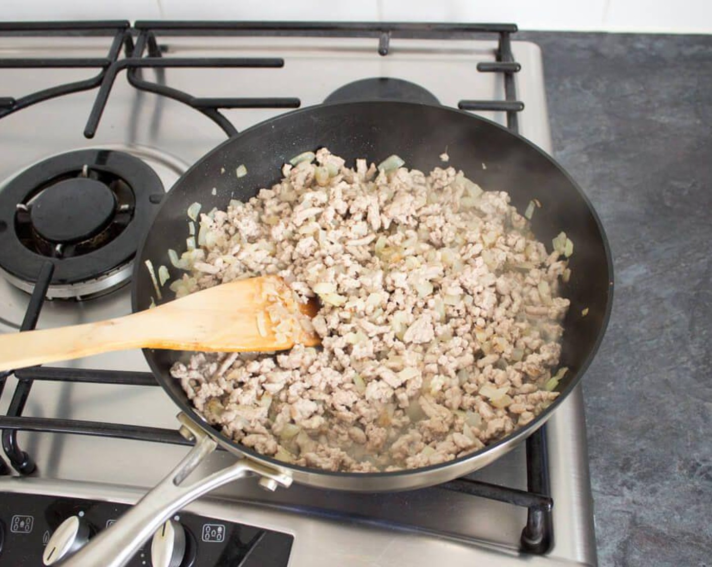step 3 Add the Pork (16 oz) and break apart with a wooden spatula. Fry until it’s no longer pink.