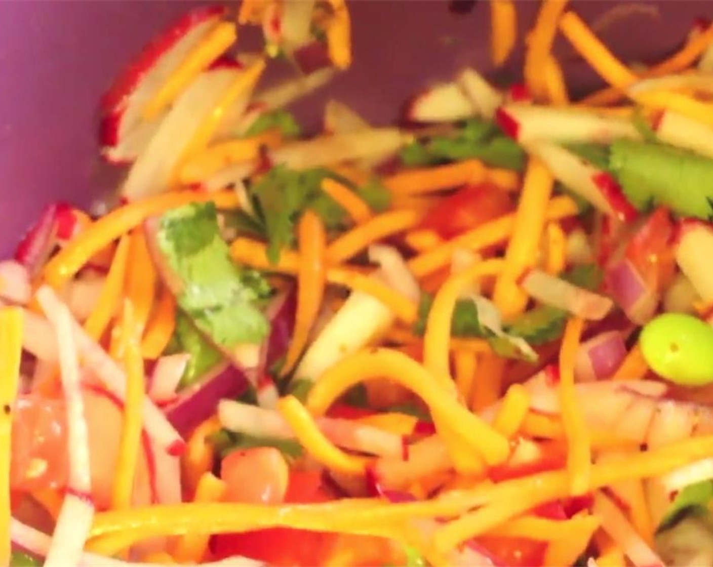 step 2 In a bowl, mix together the radishes, roma tomatoes, Carrot (1/2 cup), red onion, Edamame (1/4 cup), and cilantro.