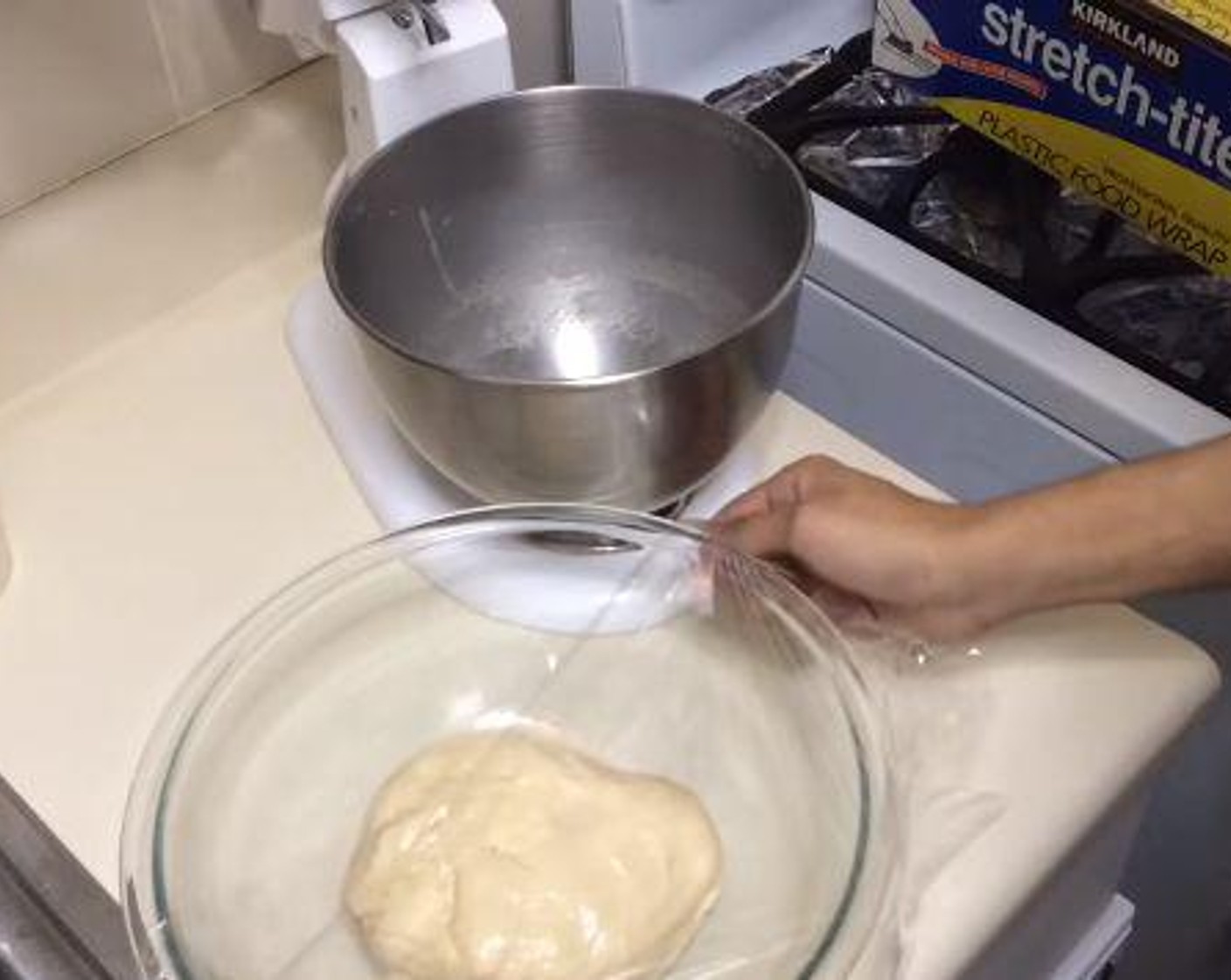 step 5 Take the ball of dough and grease it. Form it into a disk and cover with plastic wrap. Let the dough rise for 3-4 hours in a microwave or a turned-off oven.