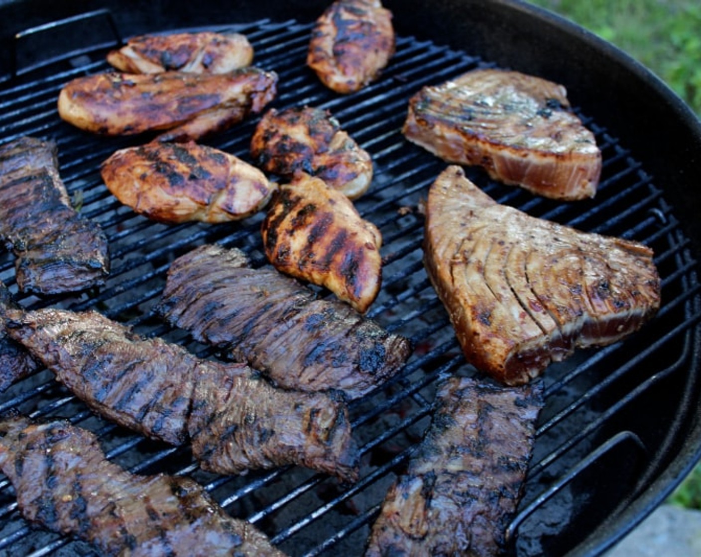 step 7 When ready to grill the chicken, prepare a charcoal fire on one side of the grill. Alternatively, turn your gas grill to medium heat, or heat a grill pan on the stovetop over medium heat. Grill chicken for 10 minutes on each side, or until cooked through and browned on the outside.