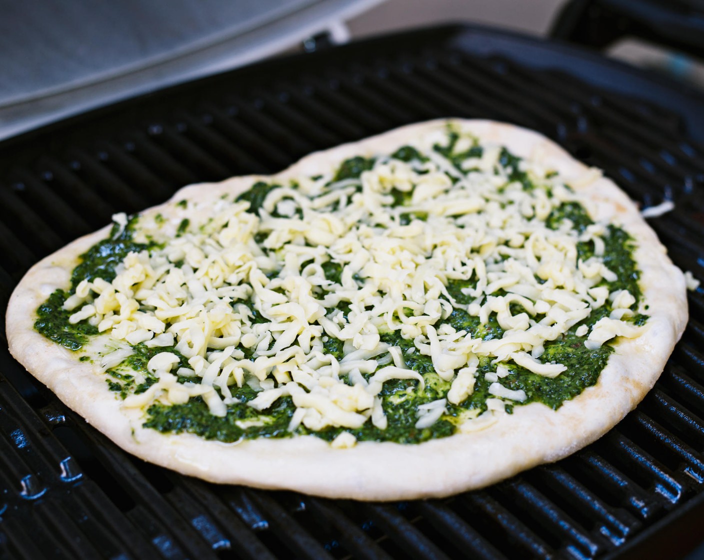 step 6 Top pesto with Monterey Jack Cheese (1 cup).