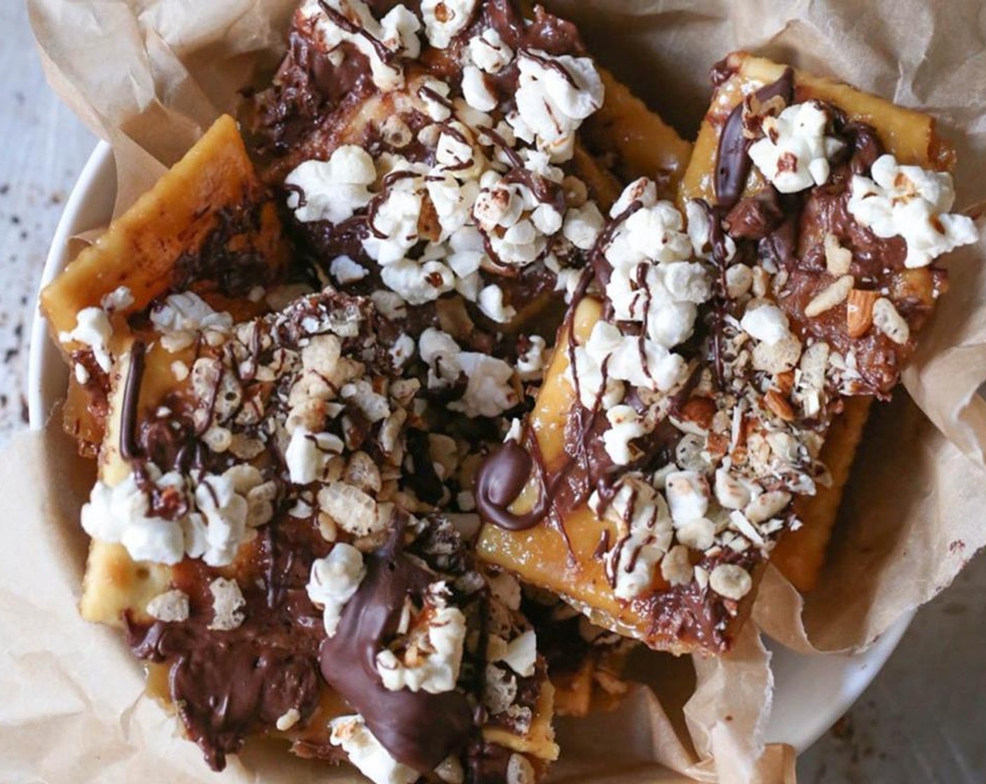 step 10 Break up the toffee saltines into any size pieces you like and serve, or store them in an airtight container in the fridge or freezer. Serve and enjoy!