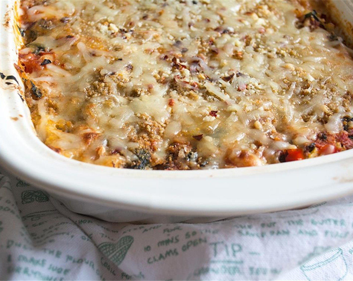 step 10 Add remaining Pasta Sauce (1 cup), spread evenly, then top with remaining Seasoned Breadcrumbs (1/4 cup), Parmesan Cheese (1/4 cup), and Mozzarella Cheese (3/4 cup).