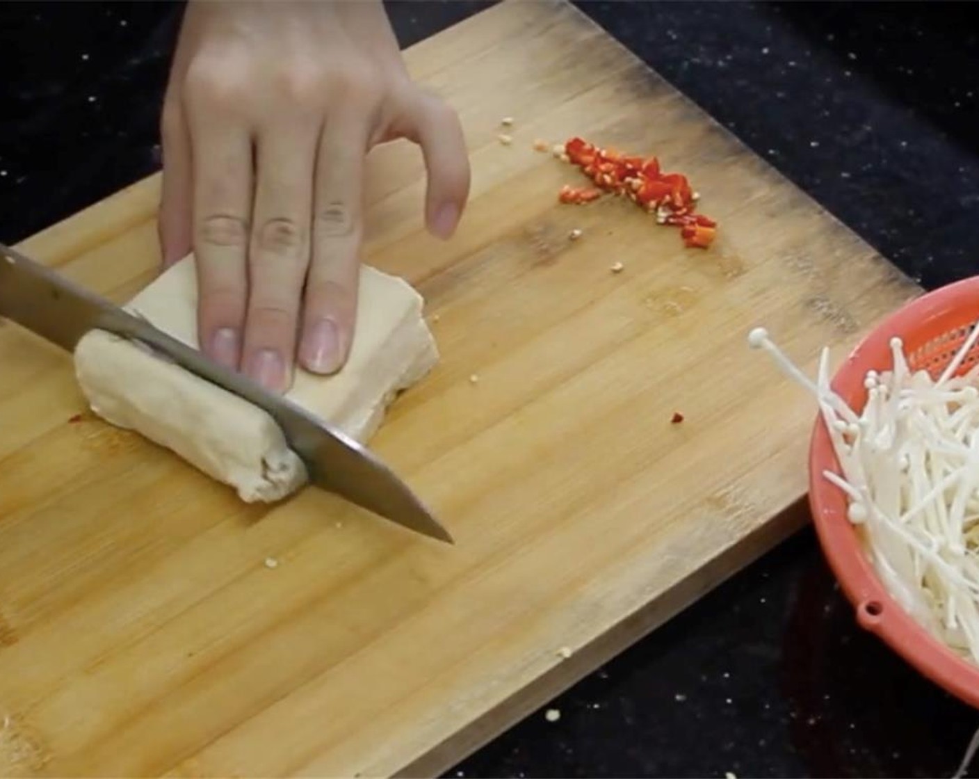 step 3 Cut Firm Tofu (3.5 oz) into bite sized pieces.