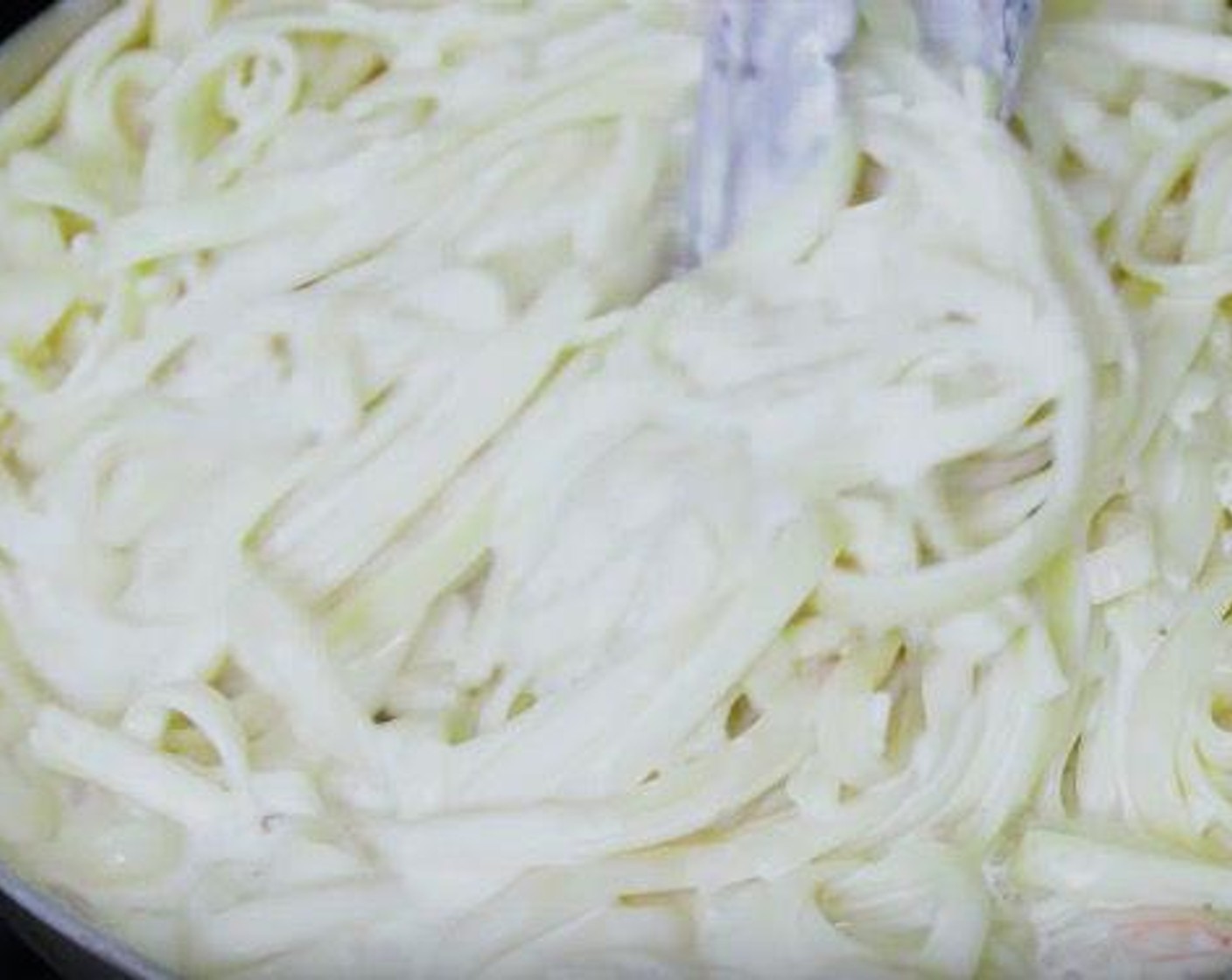 step 5 Add Parmesan Cheese (4 Tbsp) and mix. Stir in the cooked shrimps and stir. Add drained pasta and mix to coat the pasta with the sauce. It’s ok if the sauce is a bit runny, it thickens up as it sits or cools. Serve and enjoy!