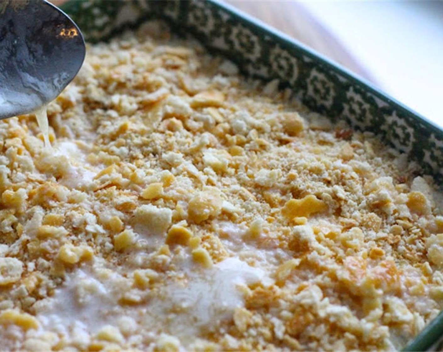 step 7 Top casserole with Monterey Jack Cheese (1 1/2 cups), Crackers (1 1/2 cups), and melted butter. Cover with foil and bake for 40 minutes. Remove the tin foil in the last 10 minutes and cook until lightly browned and bubbling.