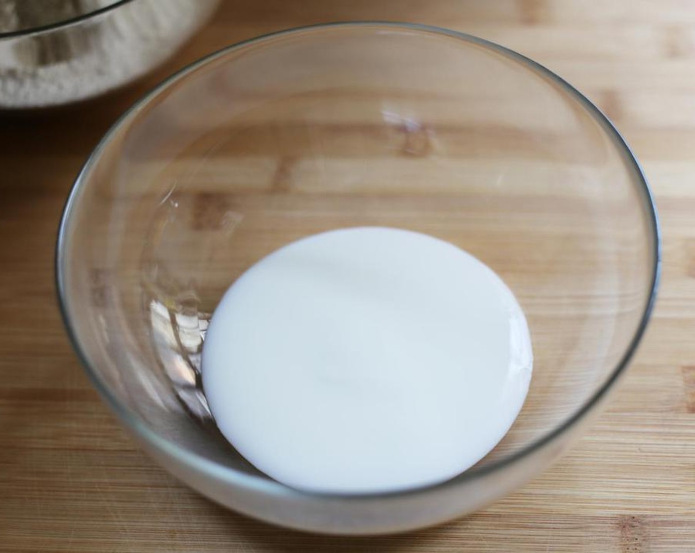 step 5 In another bowl, add the Buttermilk (1 cup).