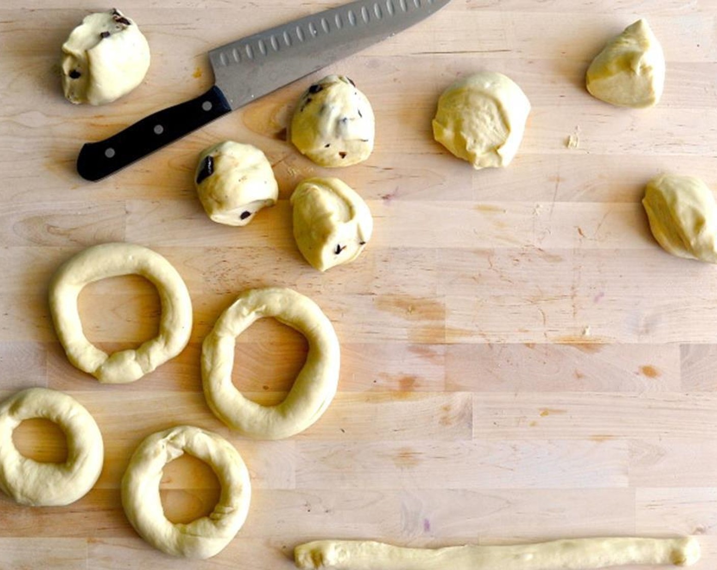 step 6 Note that your bagels will look pretty deformed at this point (the holes will be very big etc), but just remember that the dough really puffs up after they are boiled.