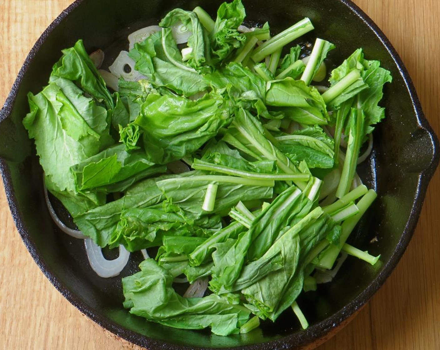 step 7 Add remaining Butter (1/2 Tbsp) and olive oil to the pan. Add shallot and Fresh Thyme (1 tsp) and sauté for 2-3 minutes until slightly tender. Add the greens and cook until just wilted. Add the potatoes back to the pan and toss to combine.