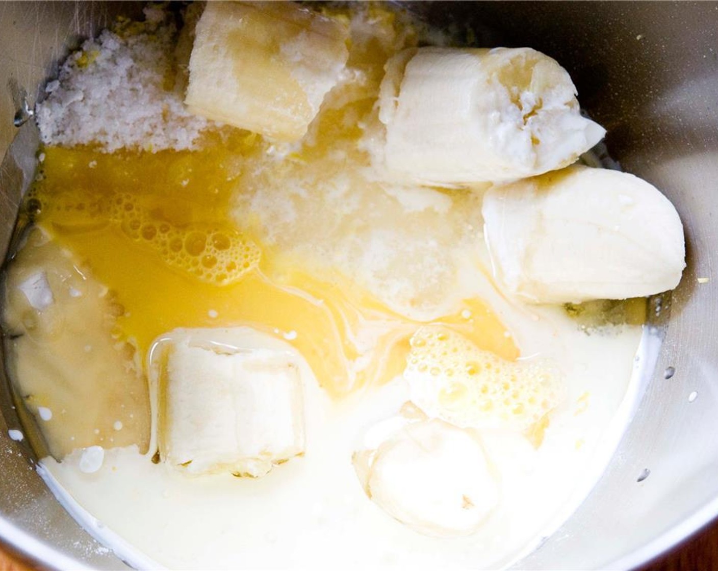 step 2 Add the All-Purpose Flour (1 1/3 cups), Granulated Sugar (3/4 cup), Bananas (2), Sunflower Oil (1/3 cup), Baking Powder (1/2 tsp), Baking Soda (1/2 tsp), Salt (to taste), Sour Cream (4 Tbsp), and Eggland's Best Classic Egg (1) to a large mixing bowl.