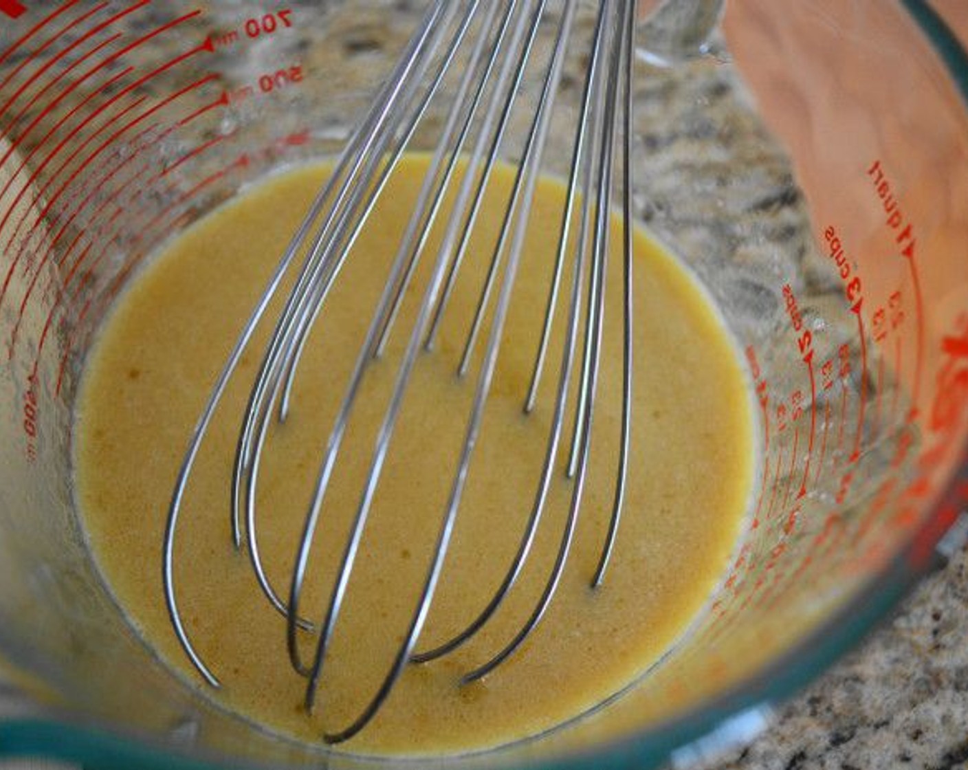 step 4 Whisk the Eggland's Best Classic Egg (1), Milk (1/2 cup), and Olive Oil (1/2 cup) together in another bowl for the wet ingredients.