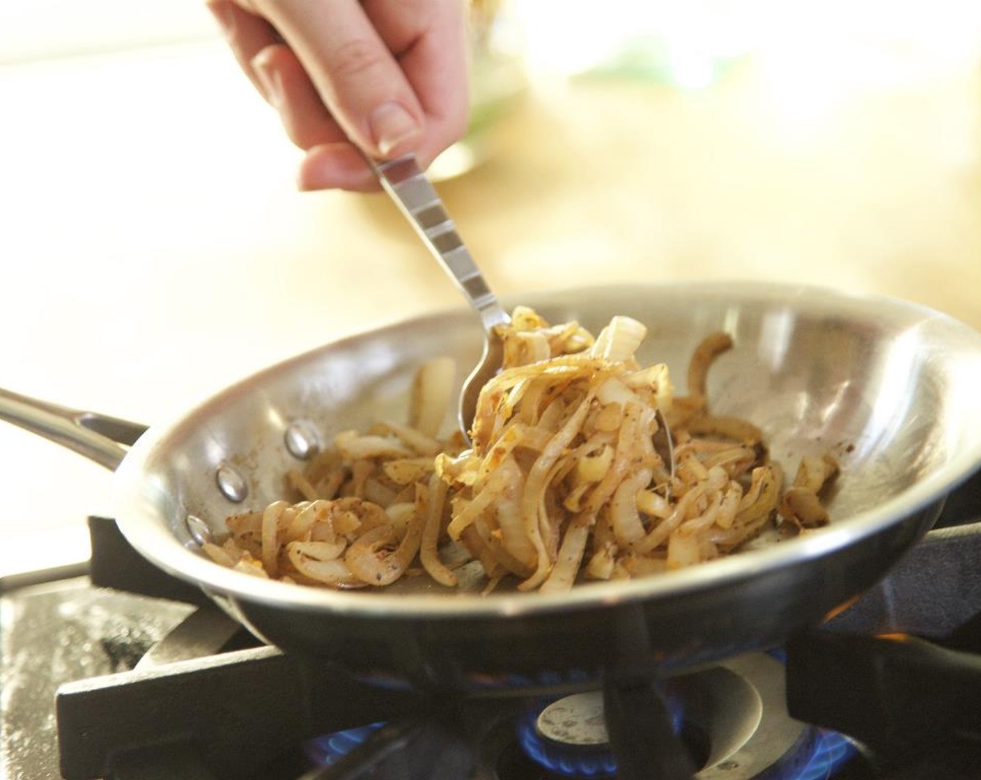 step 14 "Dry-cook"  the sliced onions for 4 to 6 minutes. Add the orange zest, orange juice, Simply Organic Cinnamon, Ground (1/4 tsp), and Ground Black Pepper (1/4 tsp). Stir constantly and cook for 1 to 2 more minutes. Remove from heat.