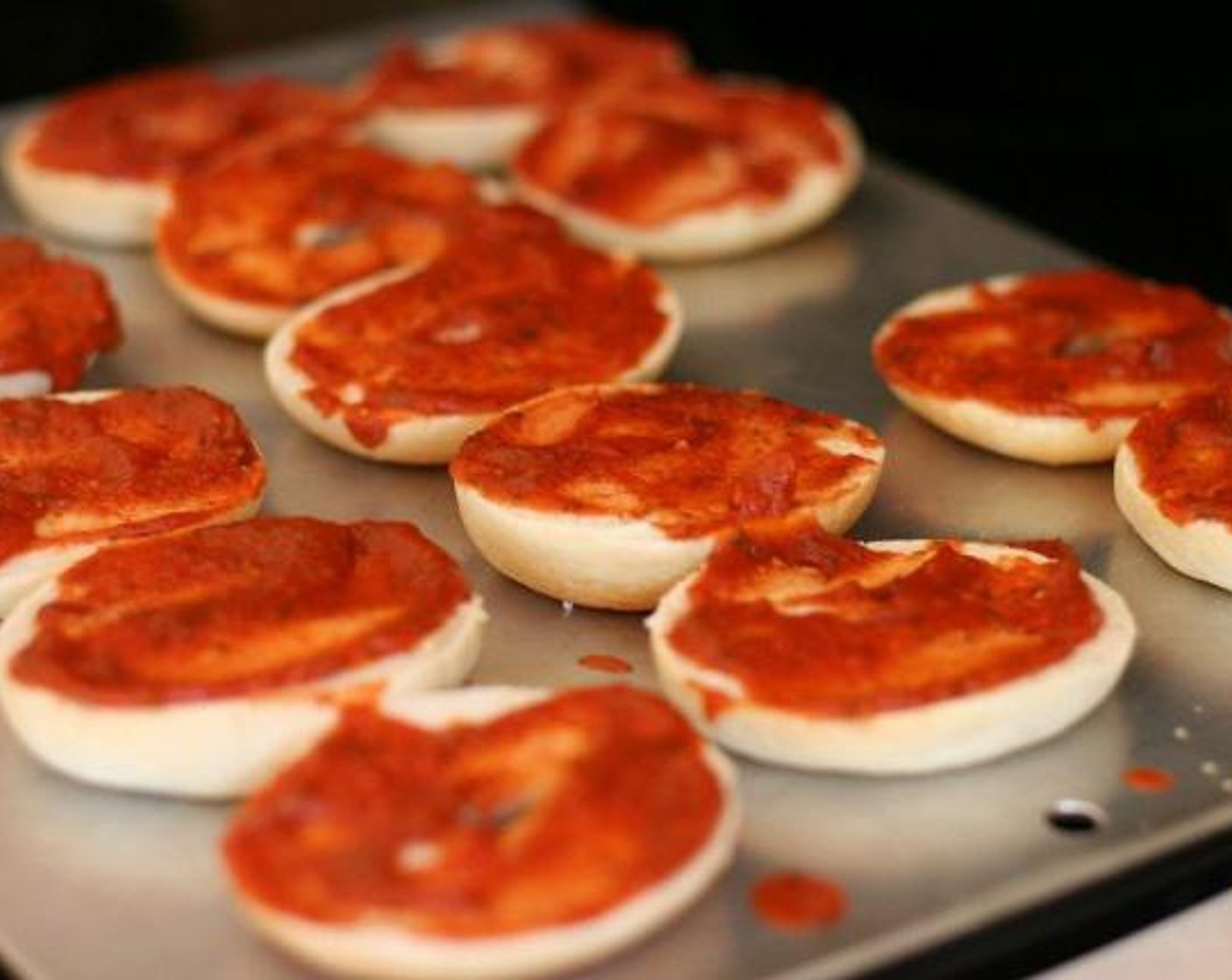 step 4 Bake the bagel pizzas for 10 minutes or until the cheese has melted. Serve and enjoy!