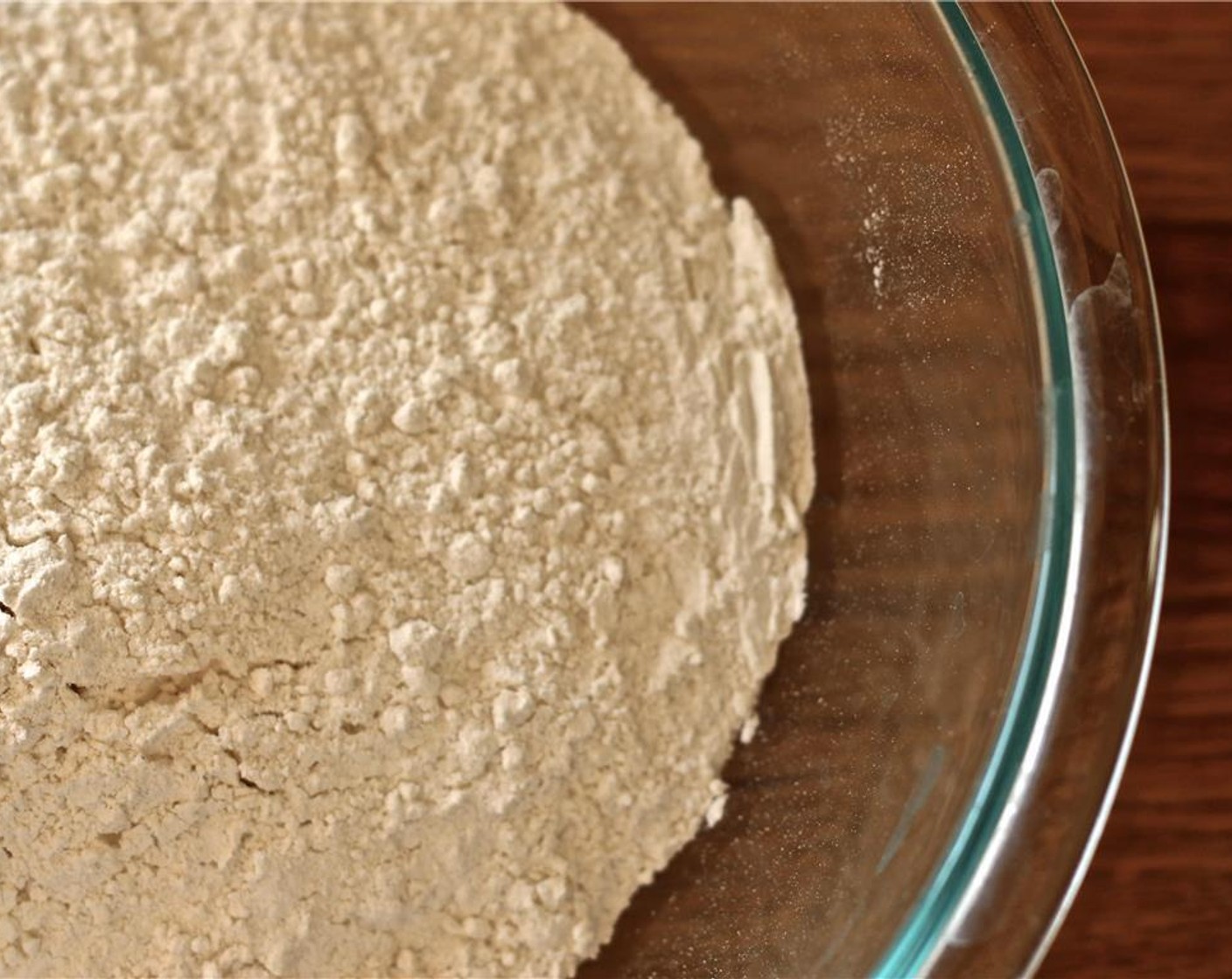 step 2 In a large bowl, thoroughly whisk together the All-Purpose Flour (3 cups) and Baking Powder (1/2 Tbsp).