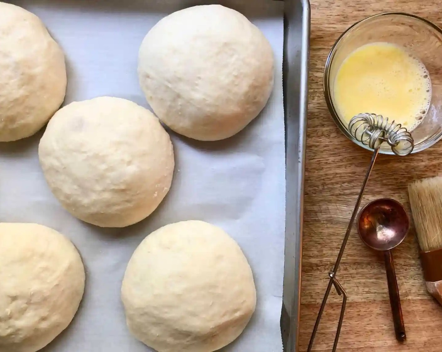 step 9 In a small bowl, whisk together Egg (1) and Water (1 Tbsp). Brush the rolls with the egg wash.