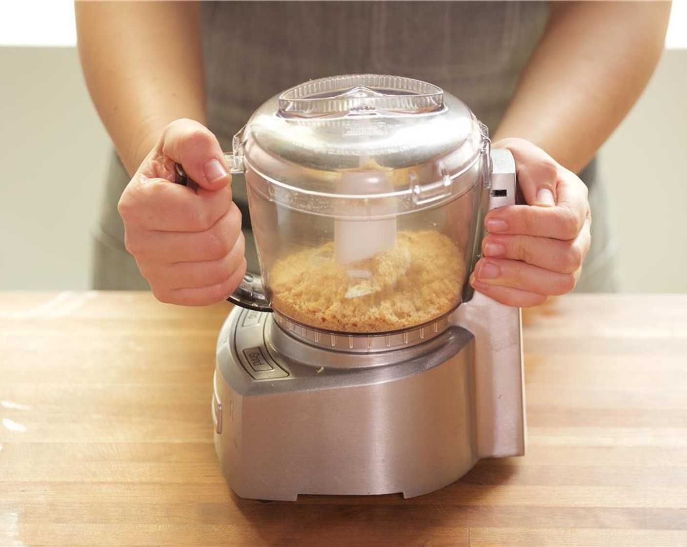 step 8 Meanwhile, pulse the Toasted Hazelnuts (2 Tbsp), Breadcrumbs (2 Tbsp), and lemon zest in a food processor until finely ground. Pour onto a plate and set aside.