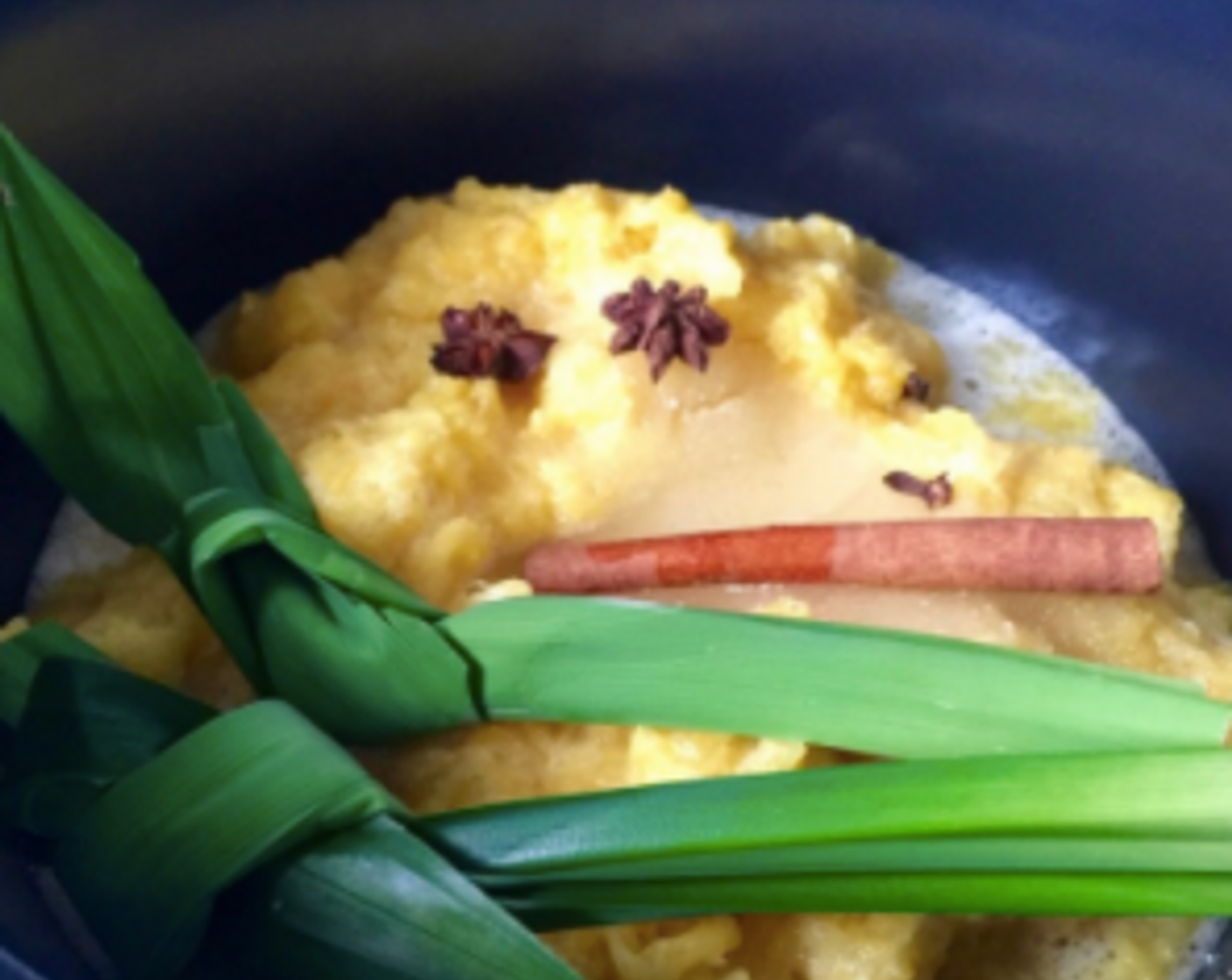 step 13 Add in the knotted Pandan Leaves (3), about 1/3 of the Granulated Sugar (1 3/4 cups) and the warm spices.